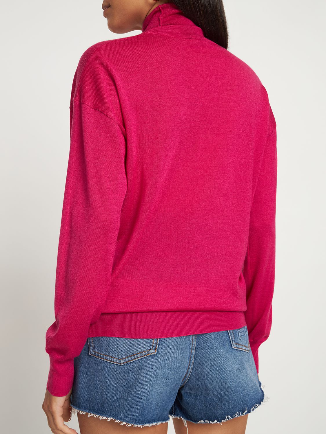 Pink turtleneck sweater elegant and comfortable