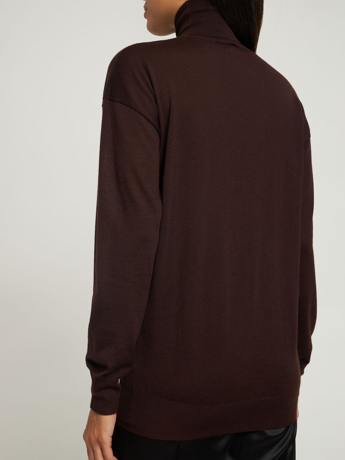Dark brown sweater with high collar versatile