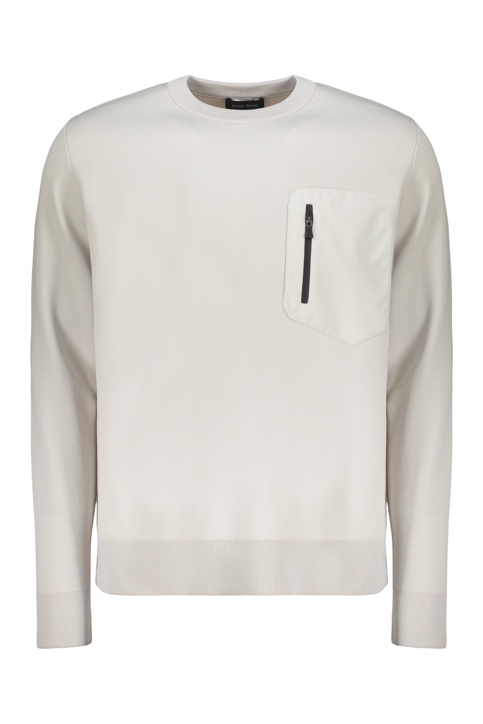 Minimalist sweater with pocket and round neck