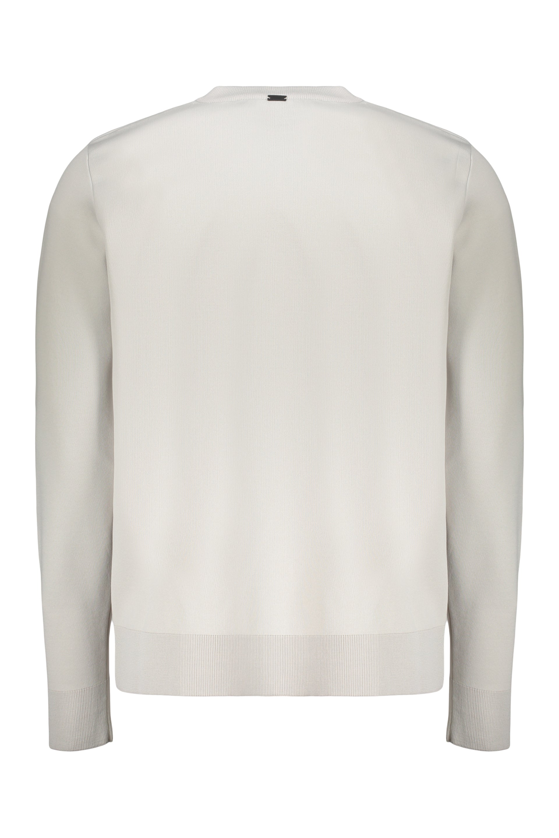 Minimalist sweater with pocket and round neck