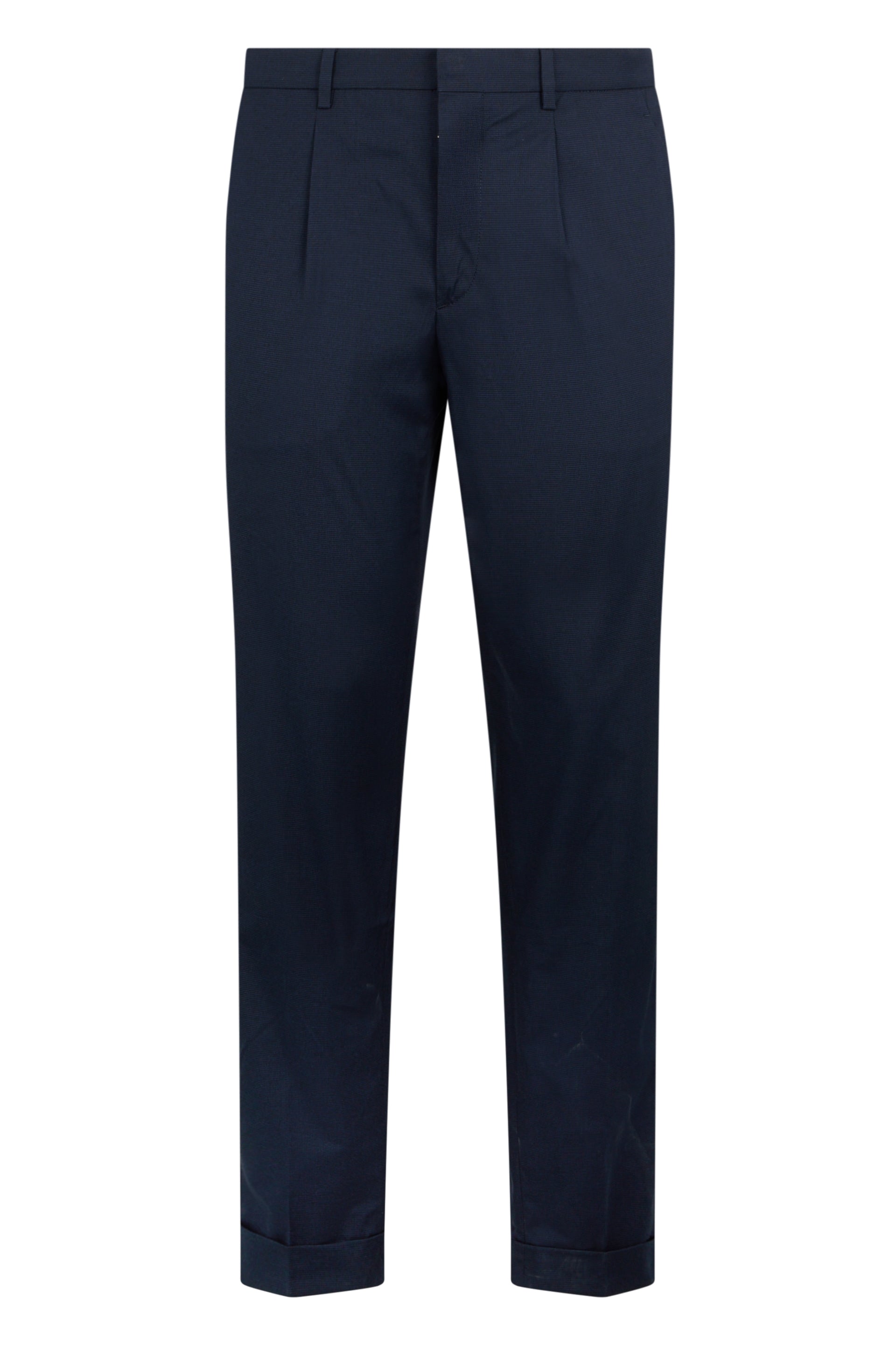 Elegant and classic trousers made of refined fabric in dark blue color.