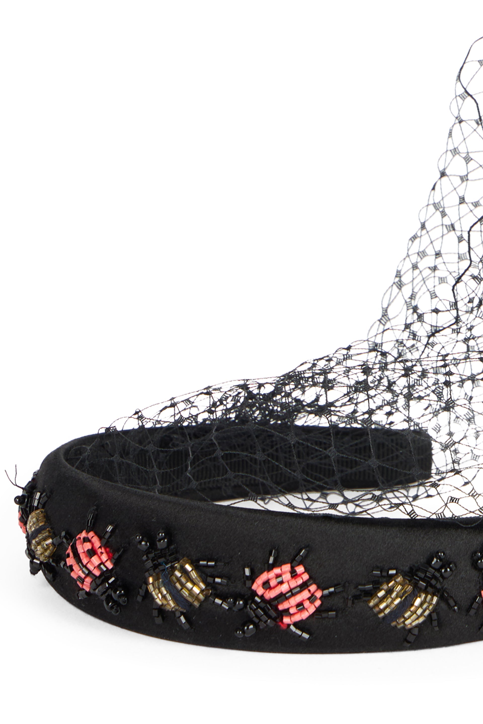 Elegant black headband with beads and tulle.