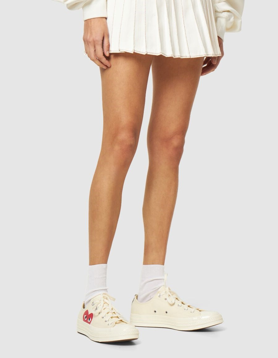Light sneakers with red details