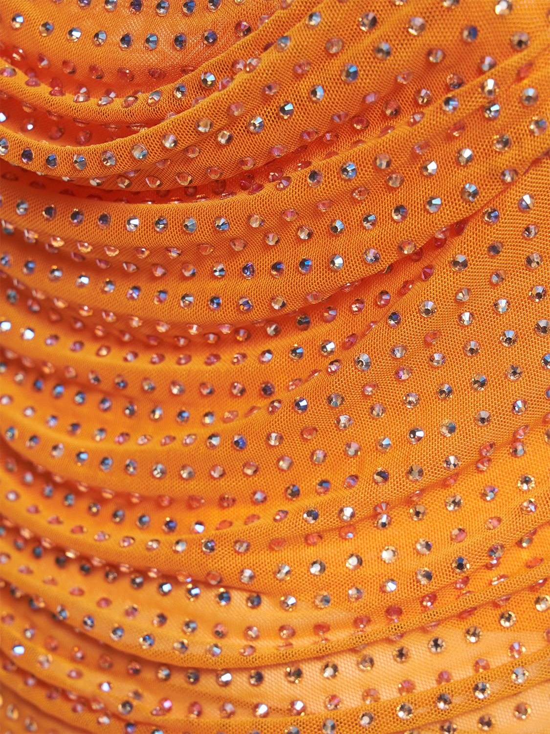 Soft orange top with elegant ruffled design