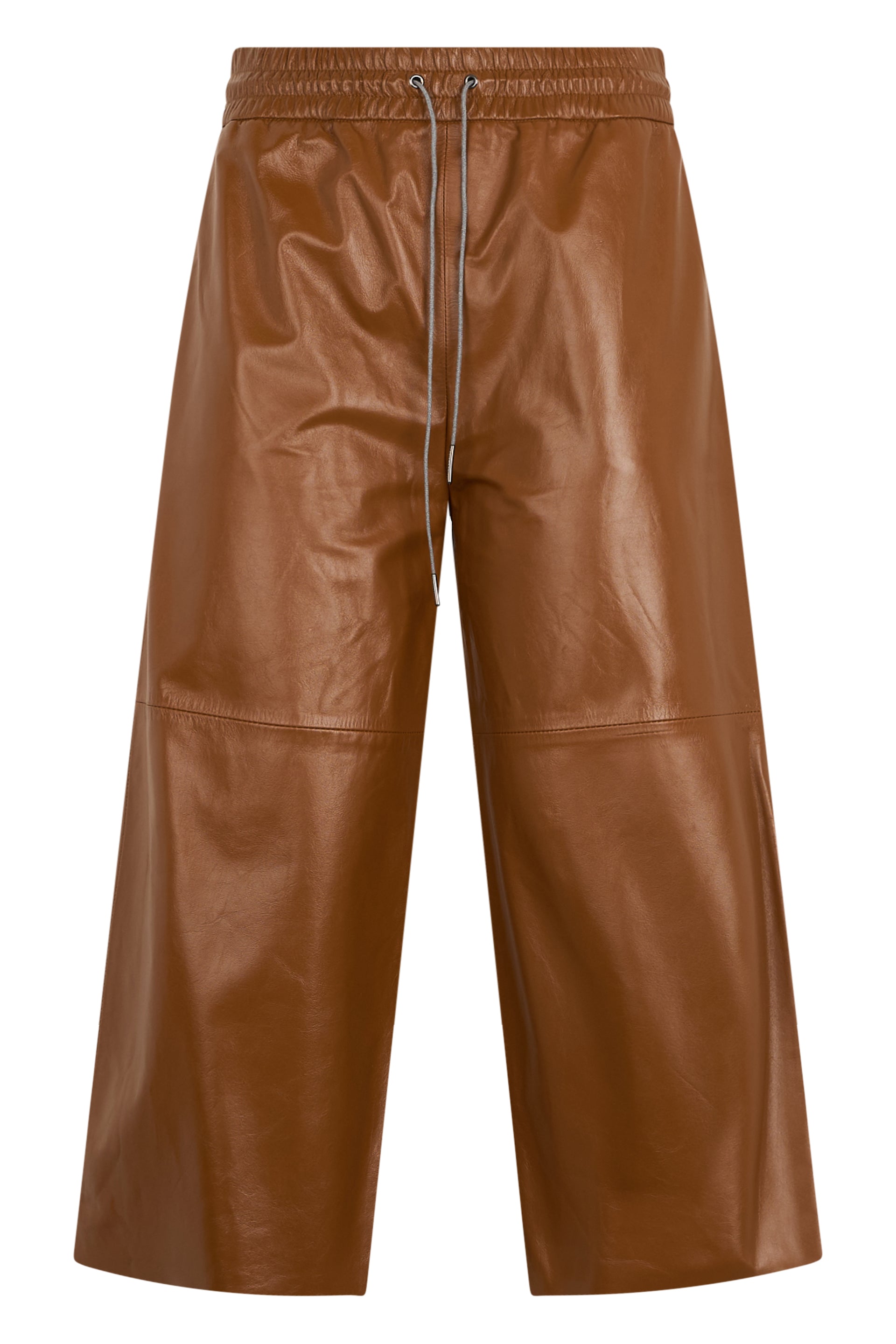 Pants in synthetic leather camel color with a loose fit.