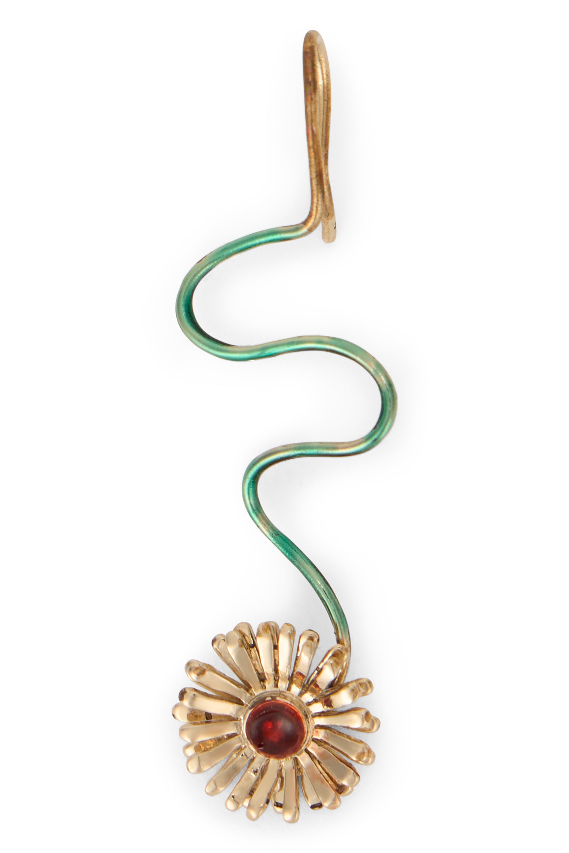 Circular gold-colored pendant elegant with flower.