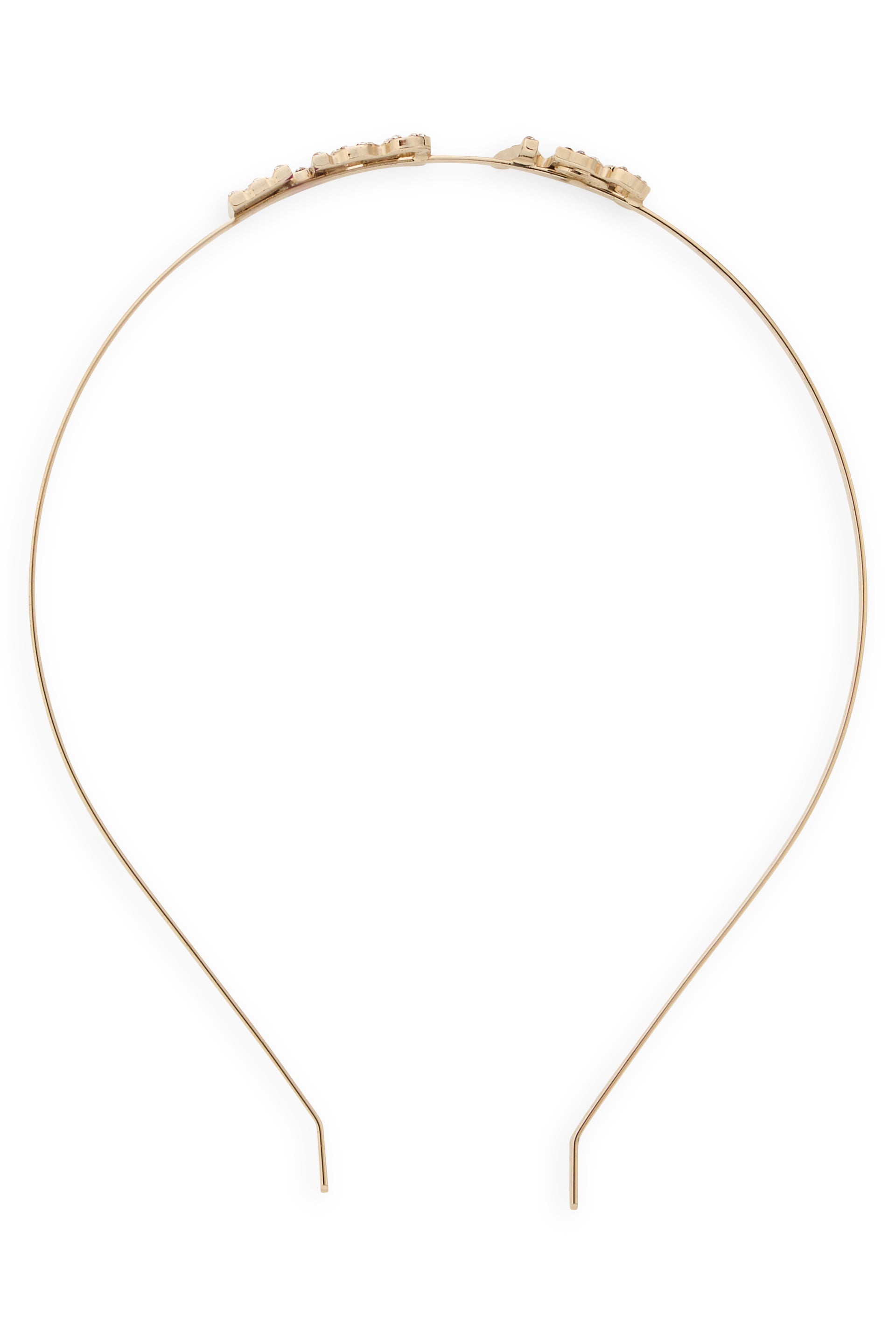 Elegant metal hairband in shiny gold color with versatile design.