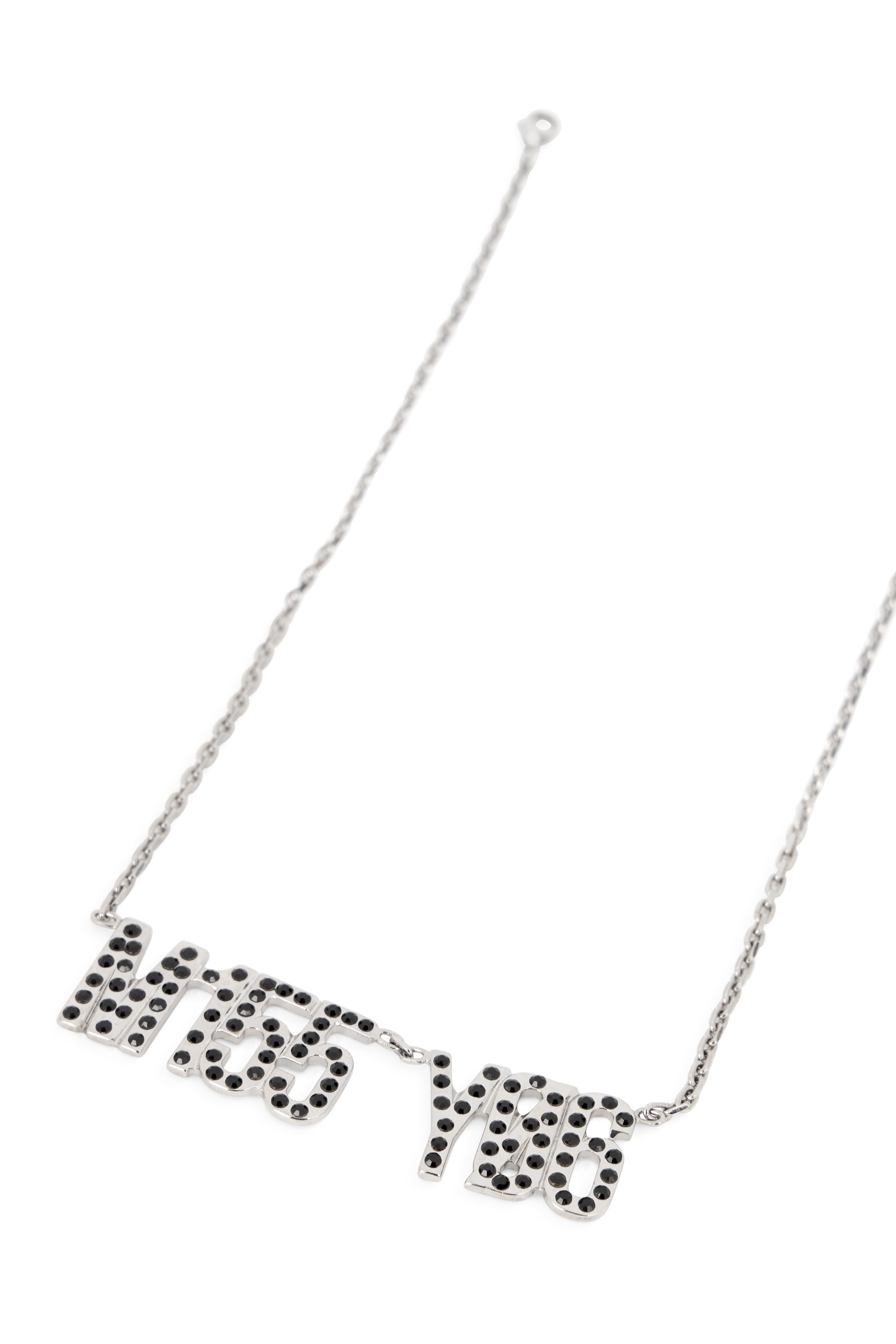 Elegant silver colored necklace with pendant.