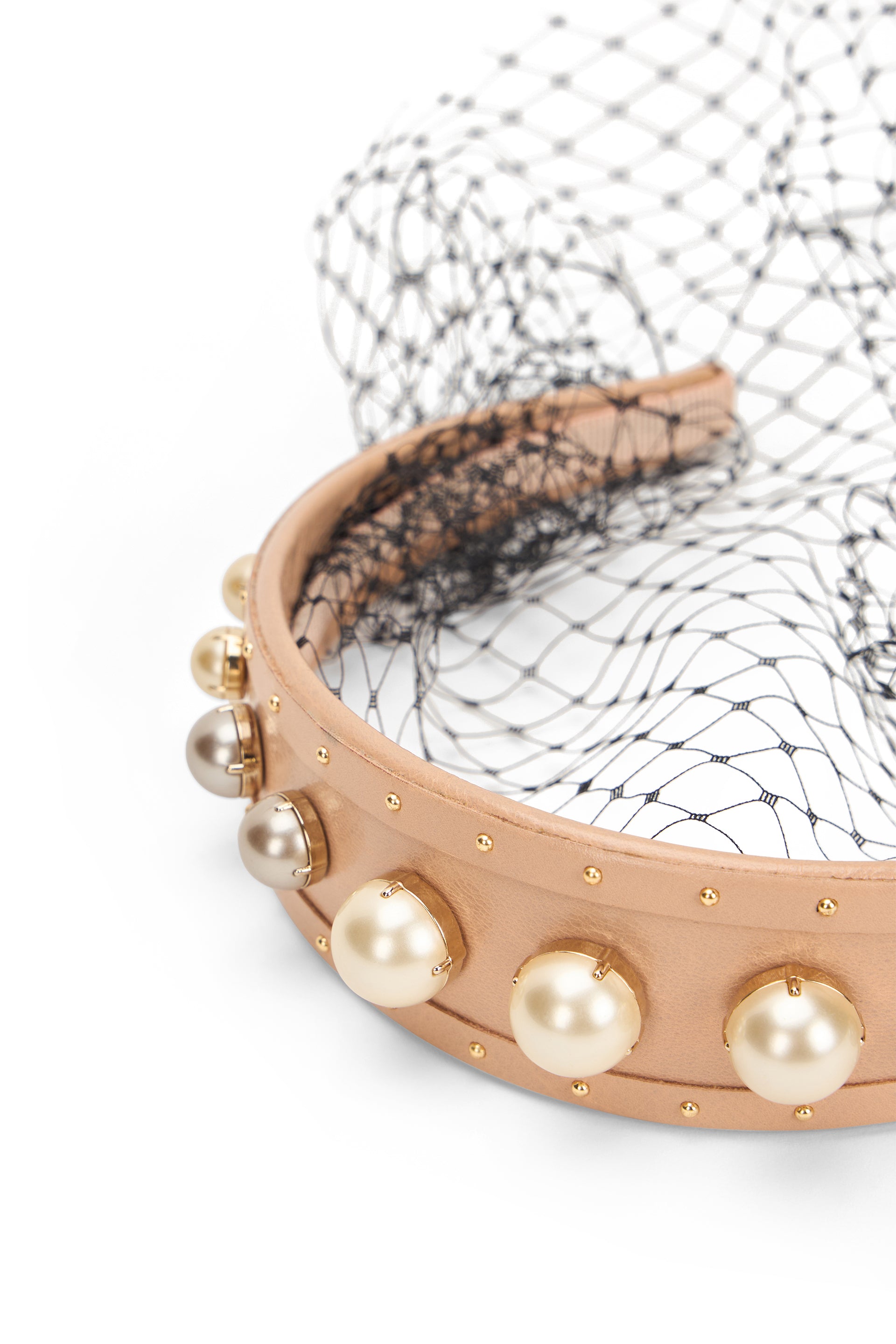 Beige elegant headband with pearls and mesh, distinctive design.