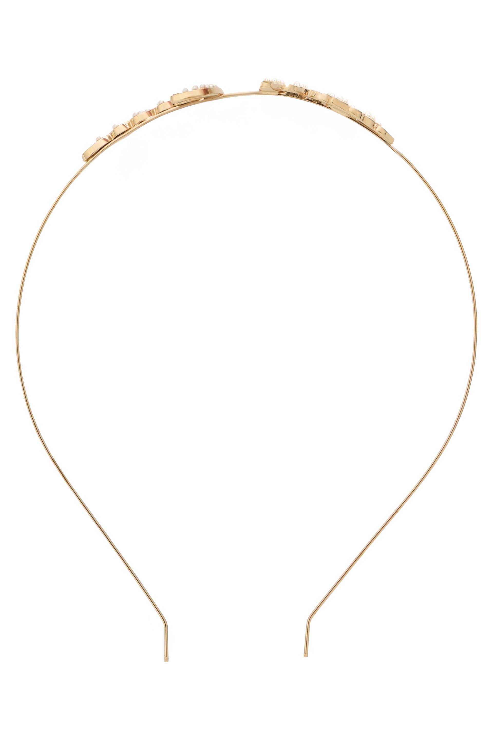 Elegant metal hairband in shiny gold color.