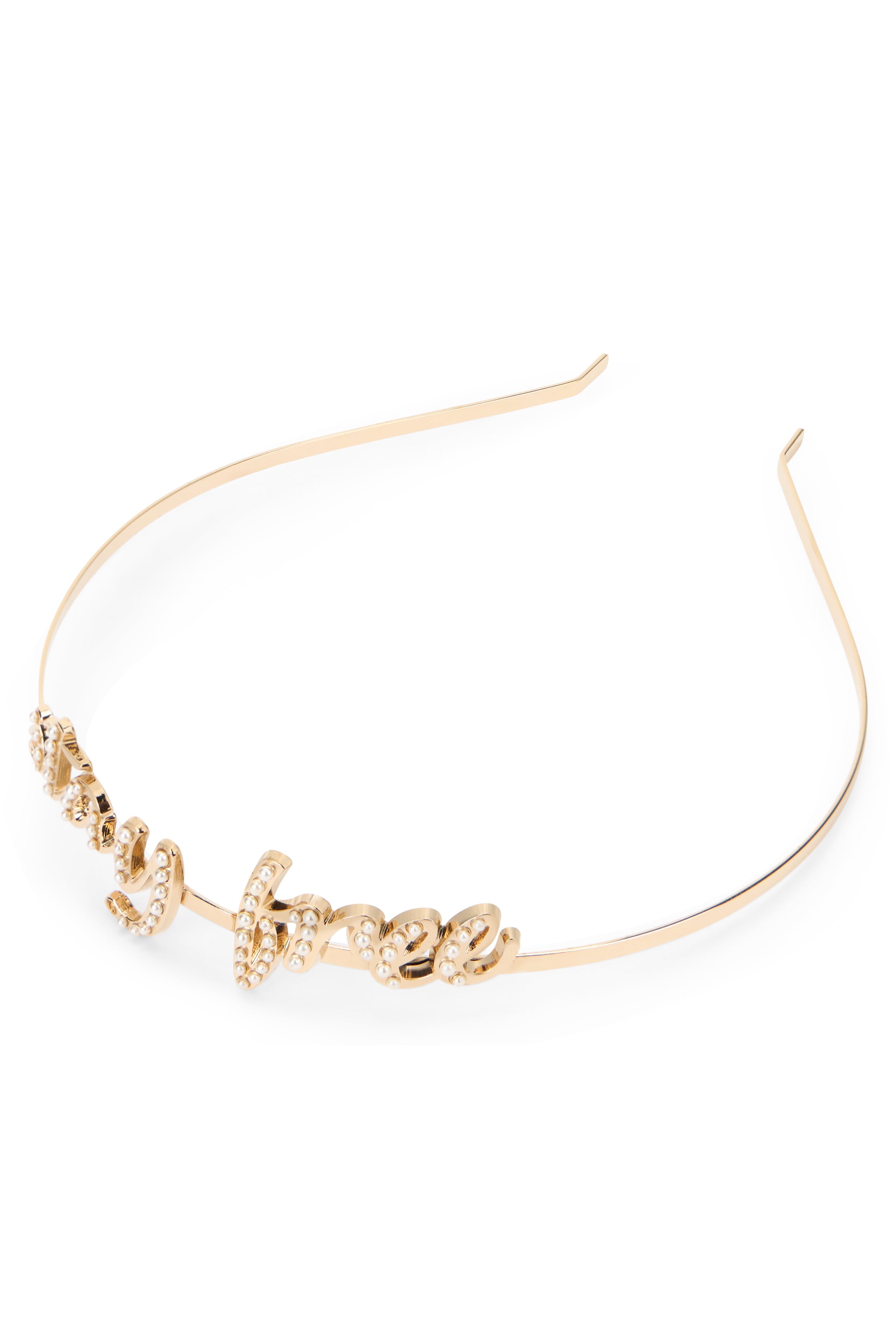 Elegant metal hairband in shiny gold color.