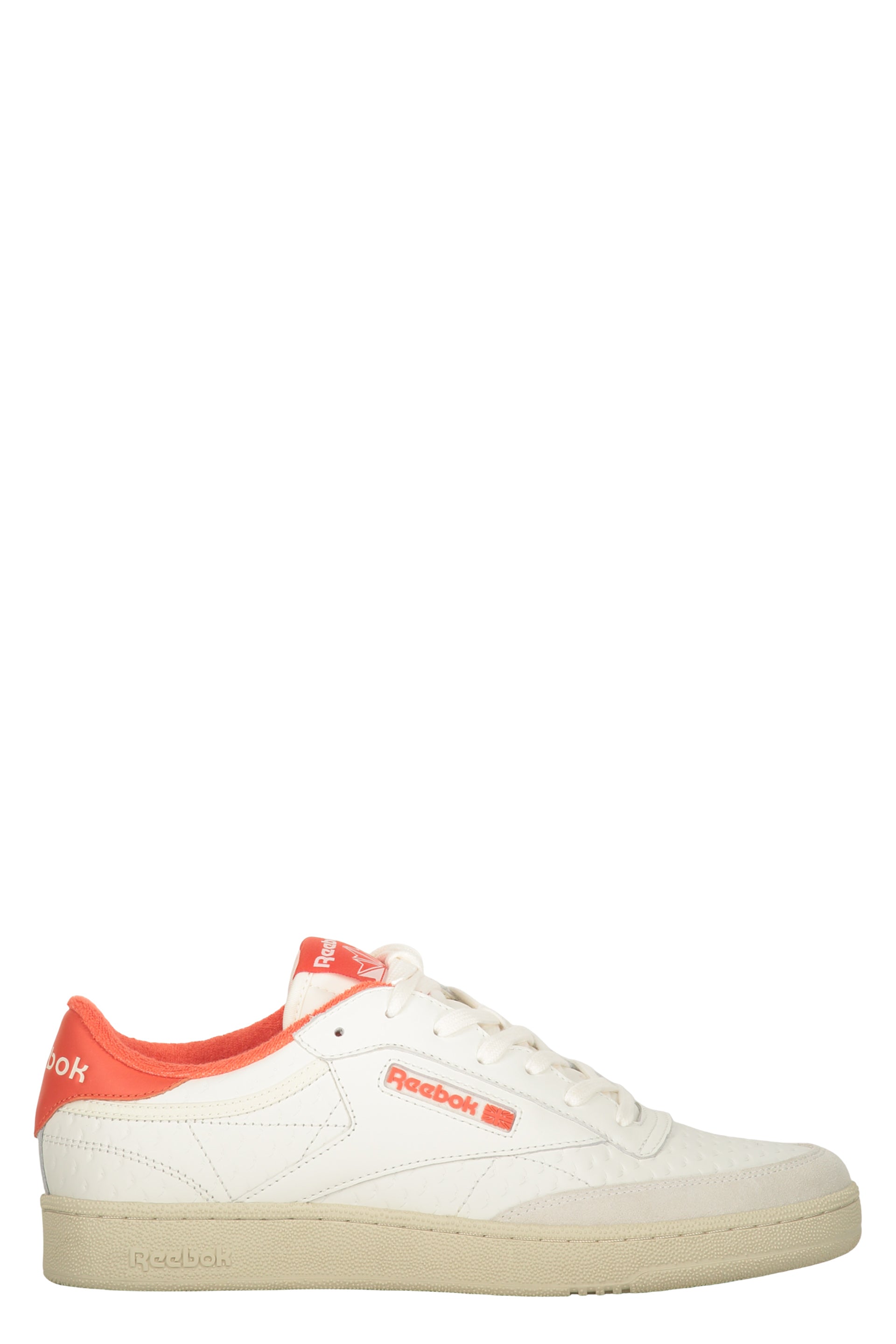 White sneakers with orange details