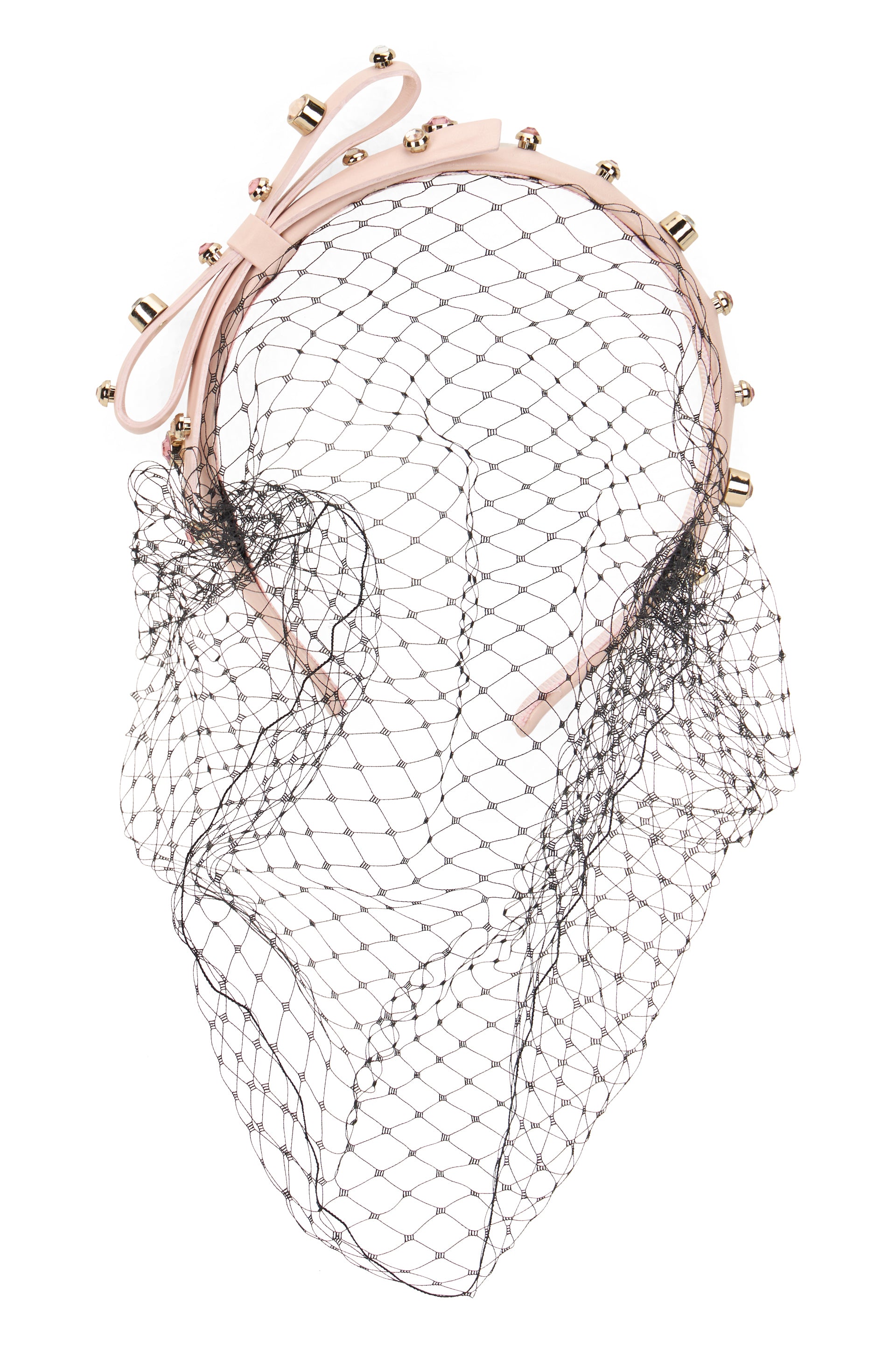 Elegant pale pink headband with tulle and decorative studs.