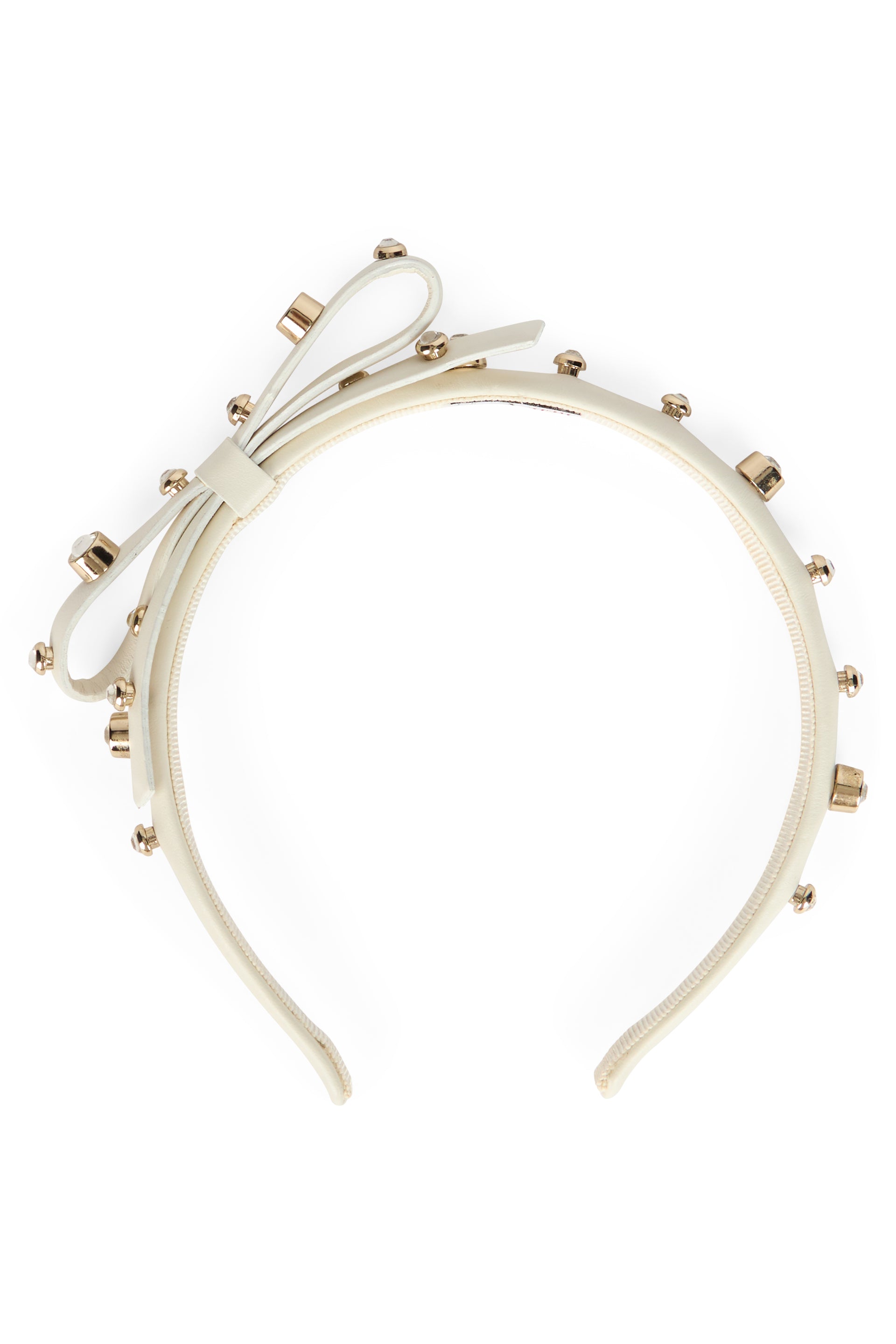 Cream color headband with bow and decorative studs.
