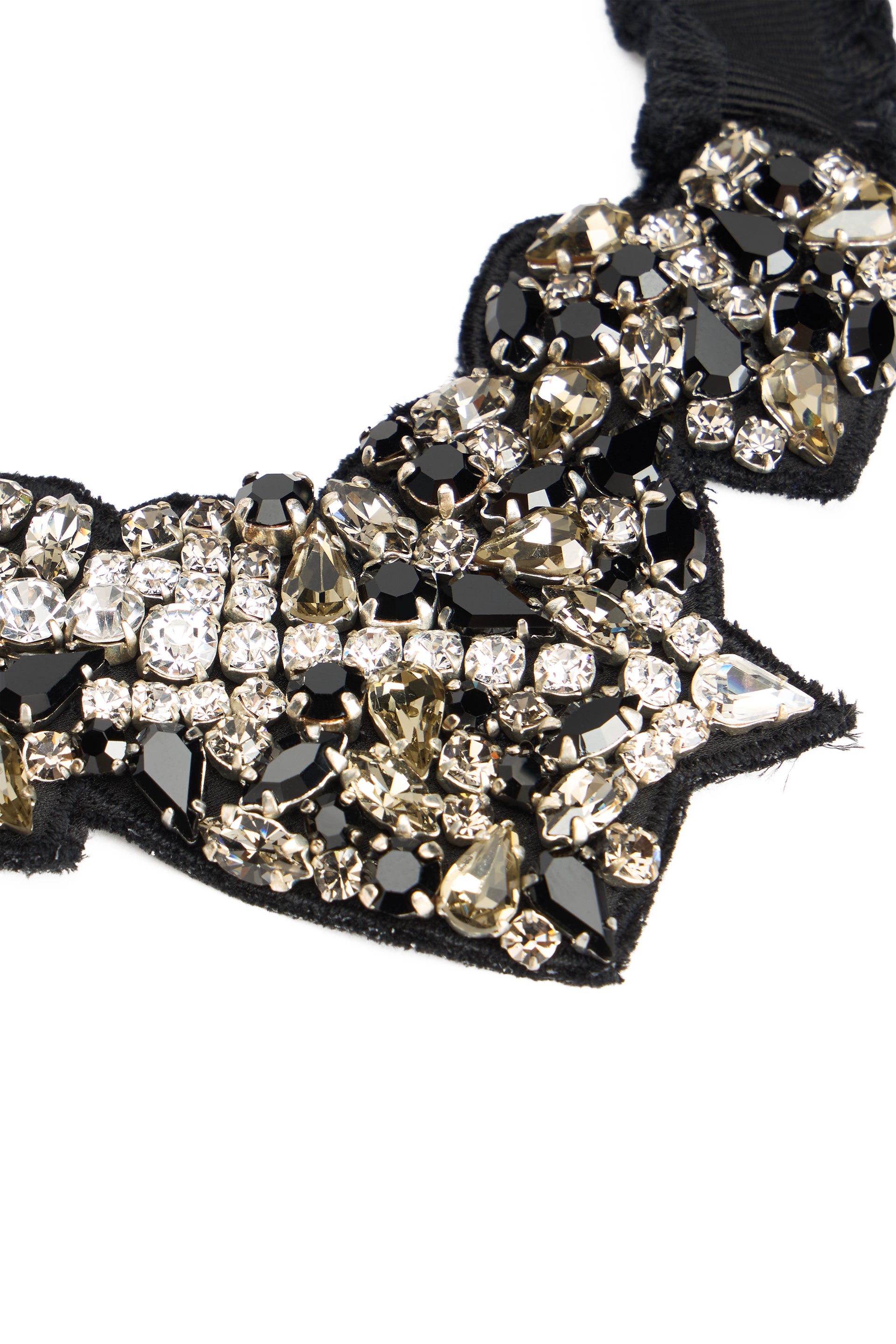 Elegant collar with black ribbon and jewelry.
