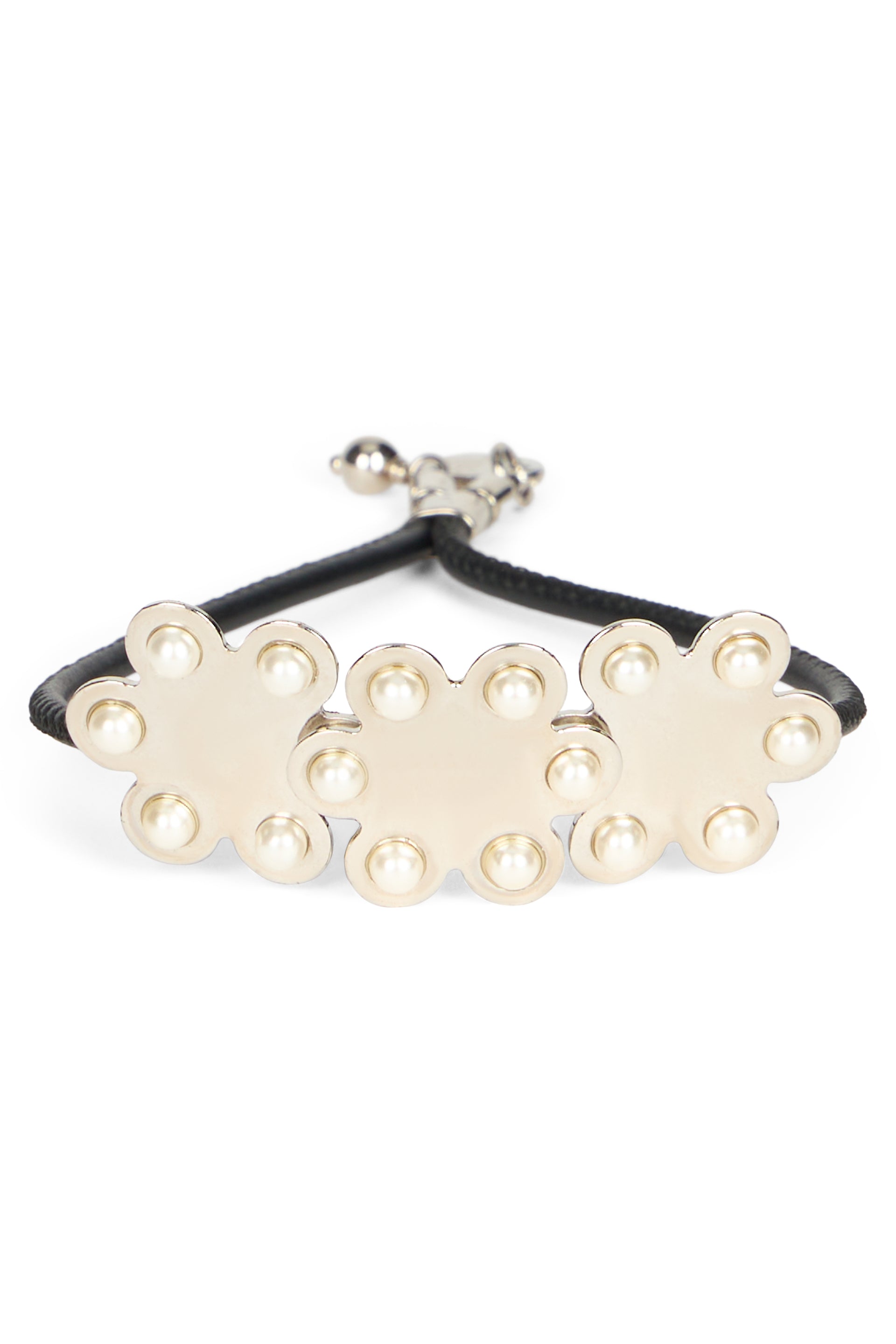 Modern metal bracelet with elegant black cord.