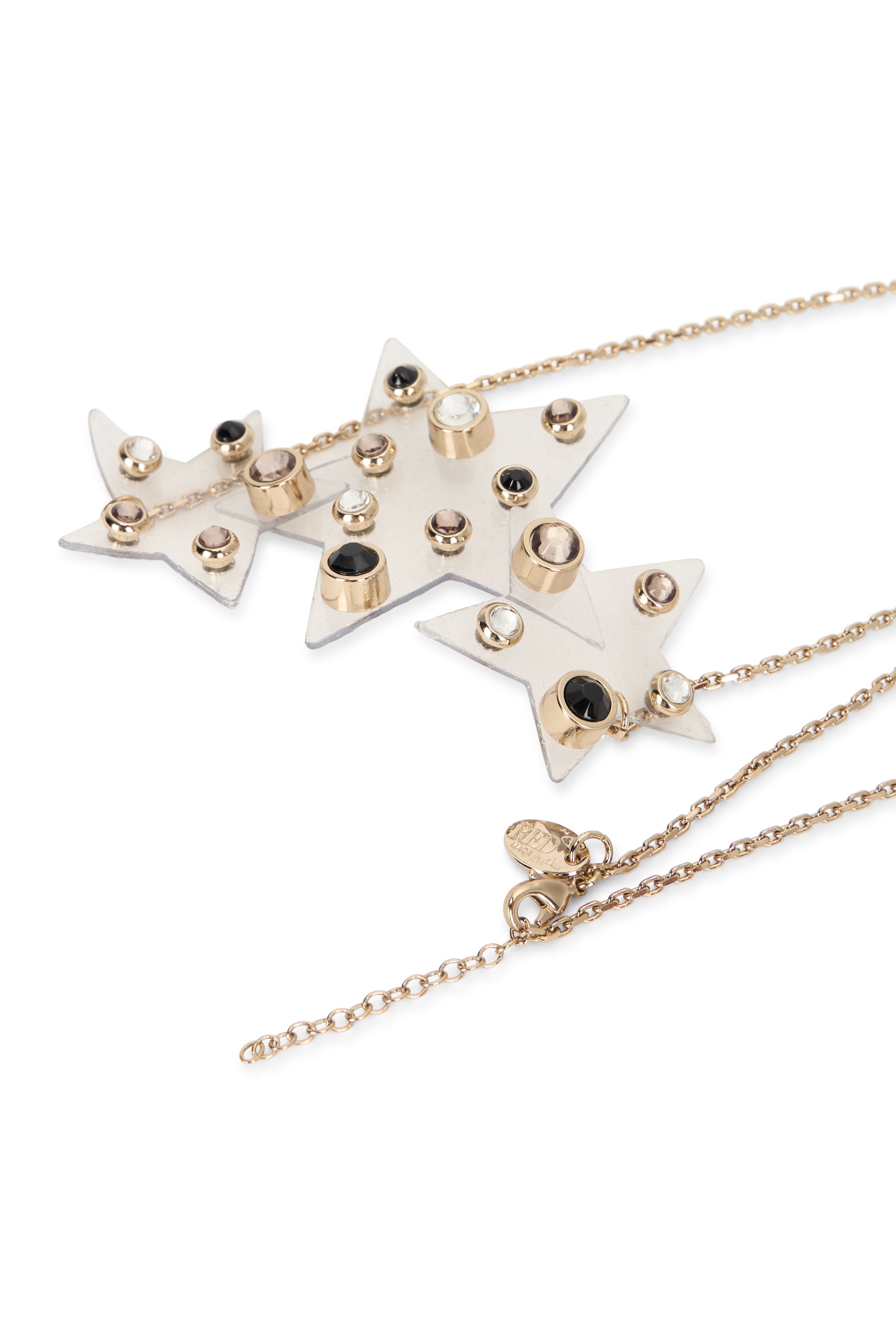 Gold necklace with ornamental pendant of versatile design.