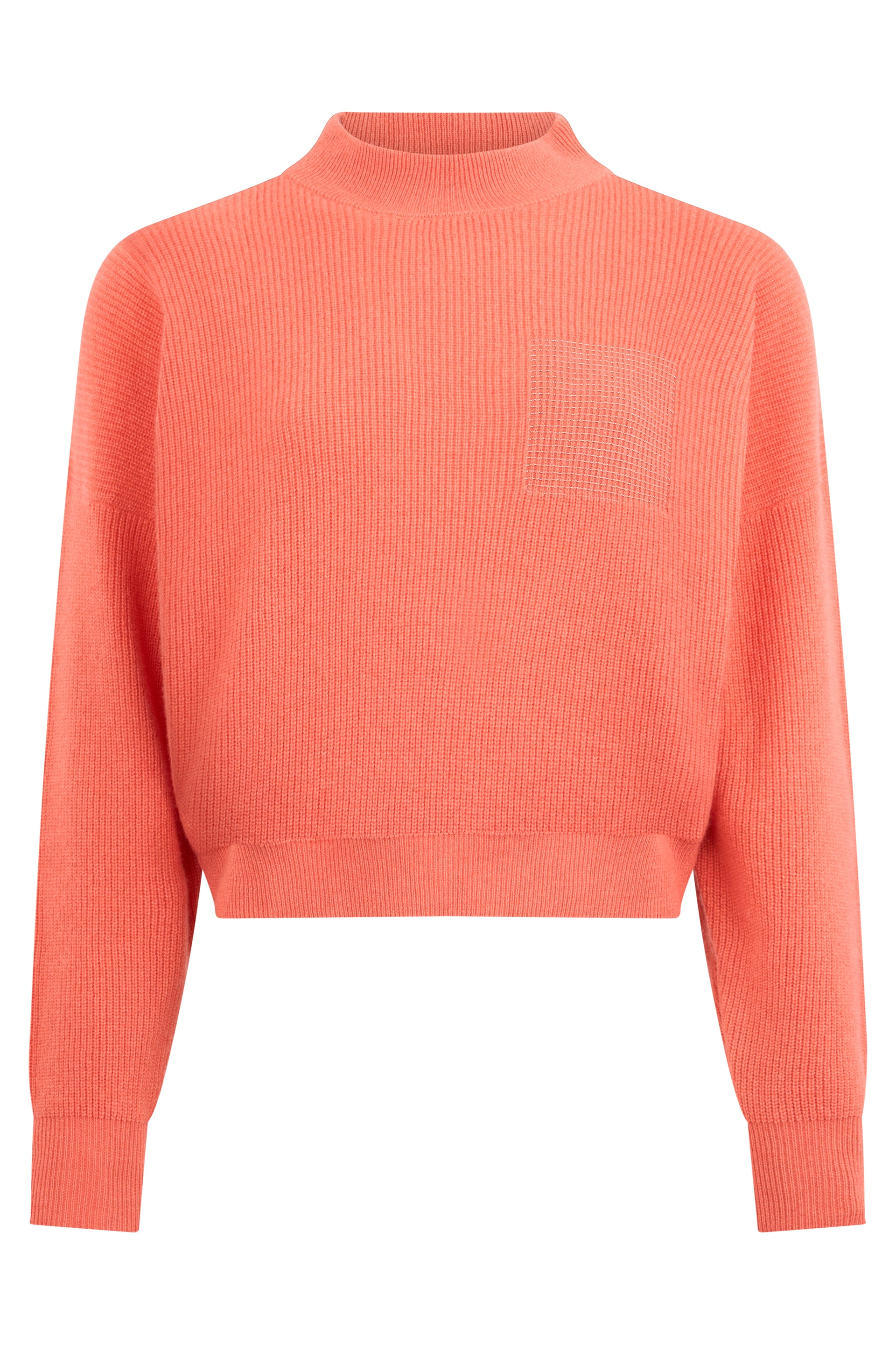 Cropped sweater in salmon color with high collar and long sleeves.