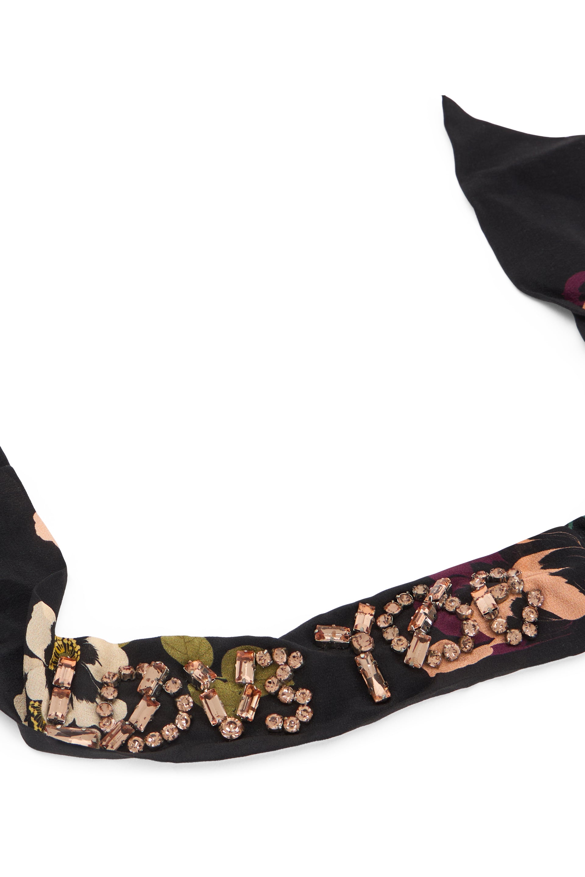 Rigid band for black elegant hair with distinctive sophisticated design.