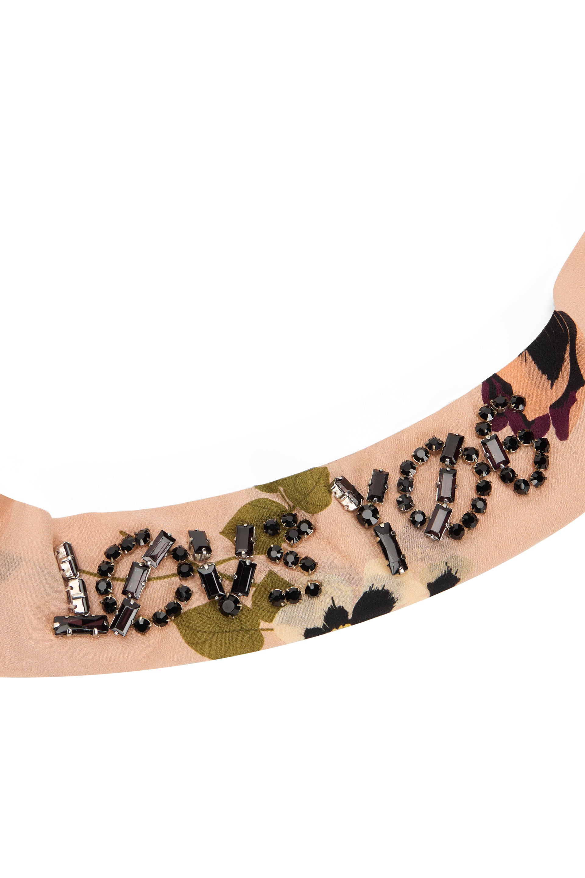 Headband with internal wire in elegant pink color with vibrant floral details.