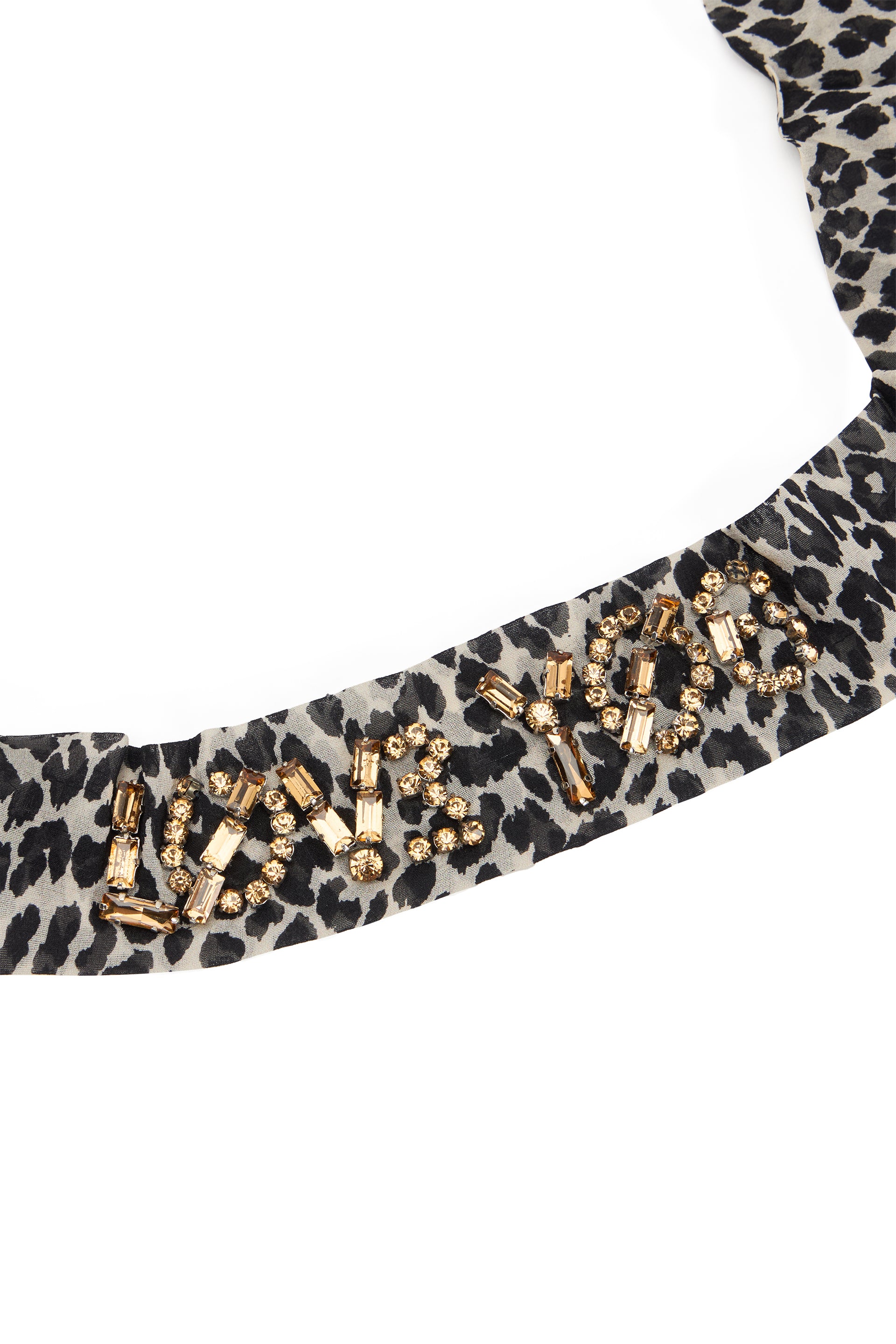 Headband in cream white color with animal pattern, elegant and refined.