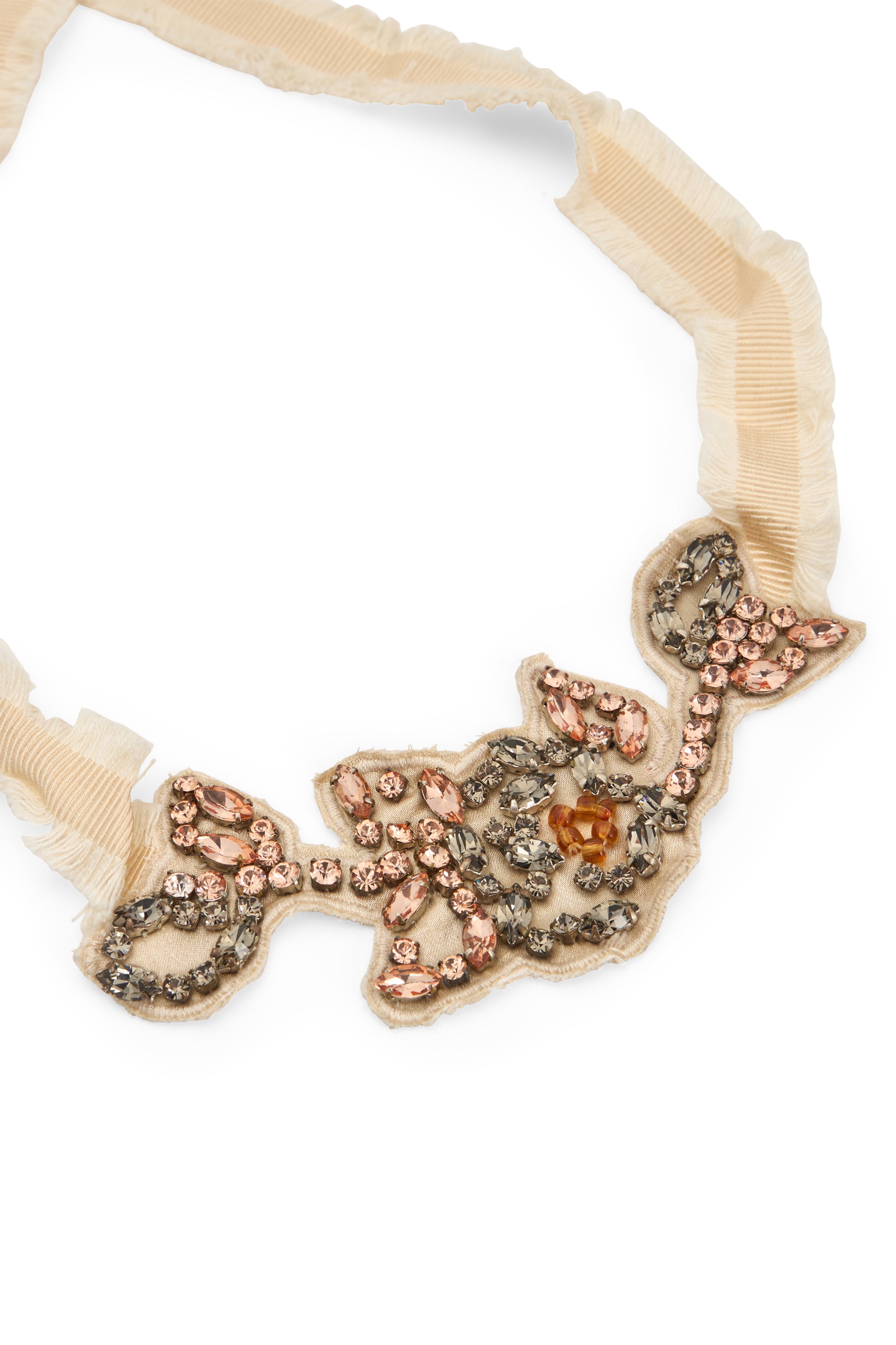Elegant beige necklace with decorative rhinestones.