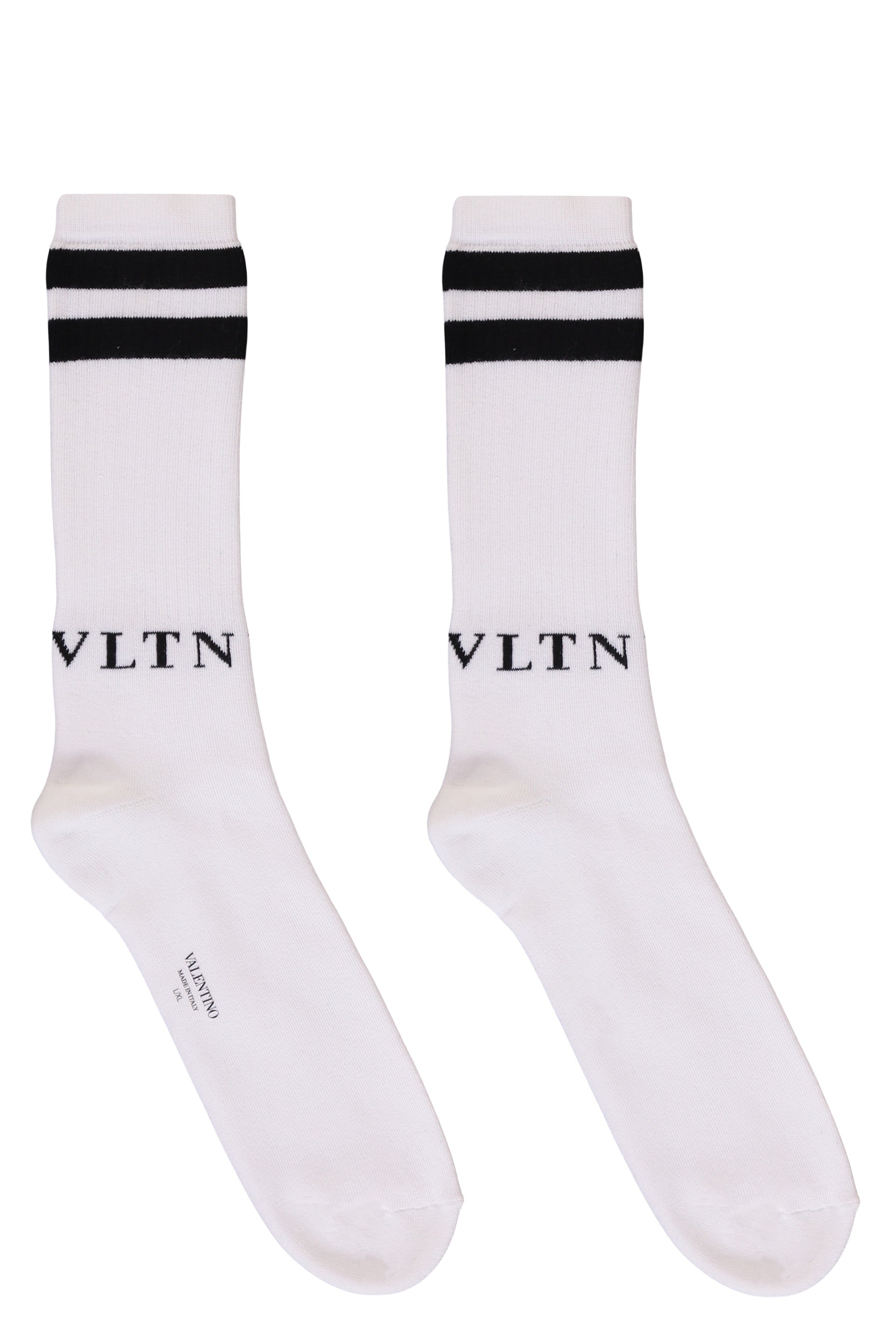 White sports socks with black stripes