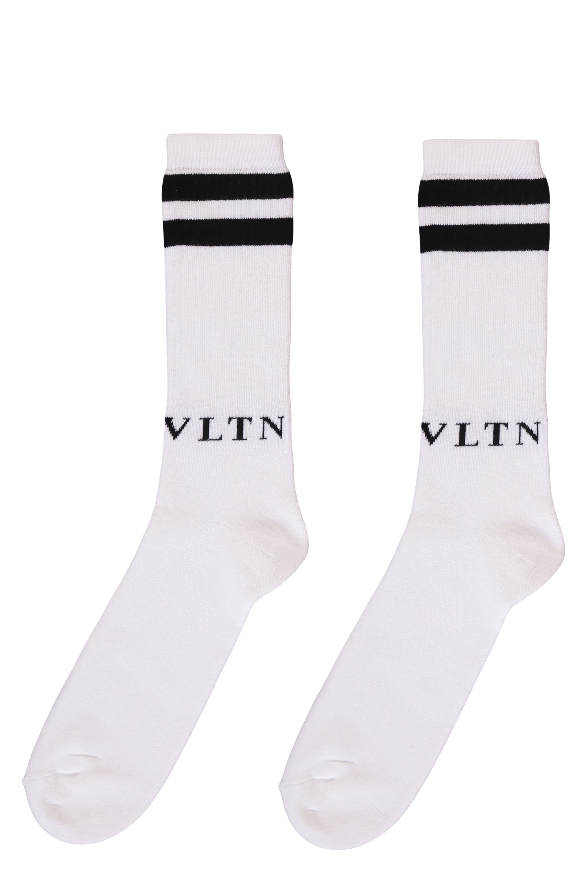 White sports socks with black stripes
