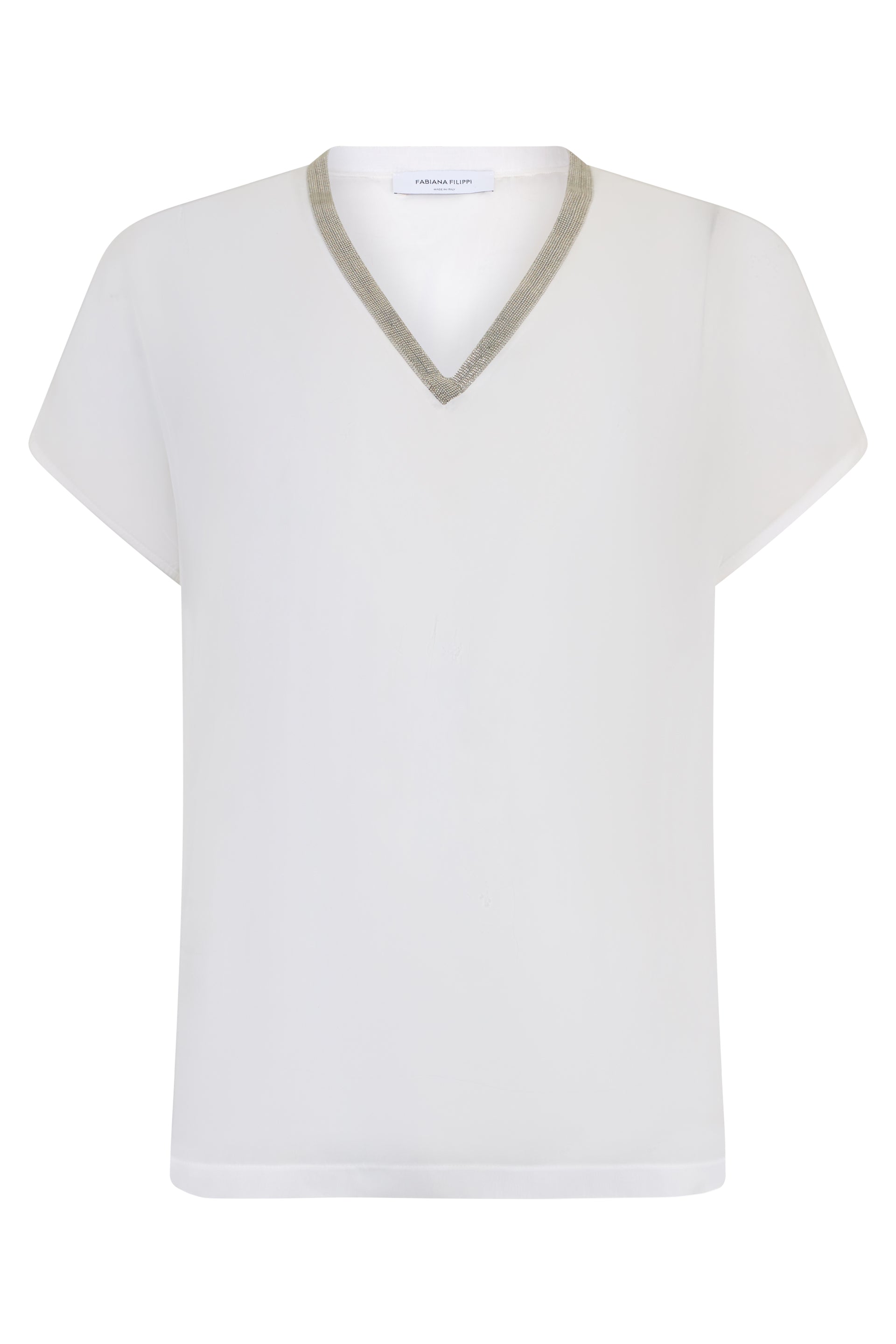 White blouse with short sleeves, minimal and chic.