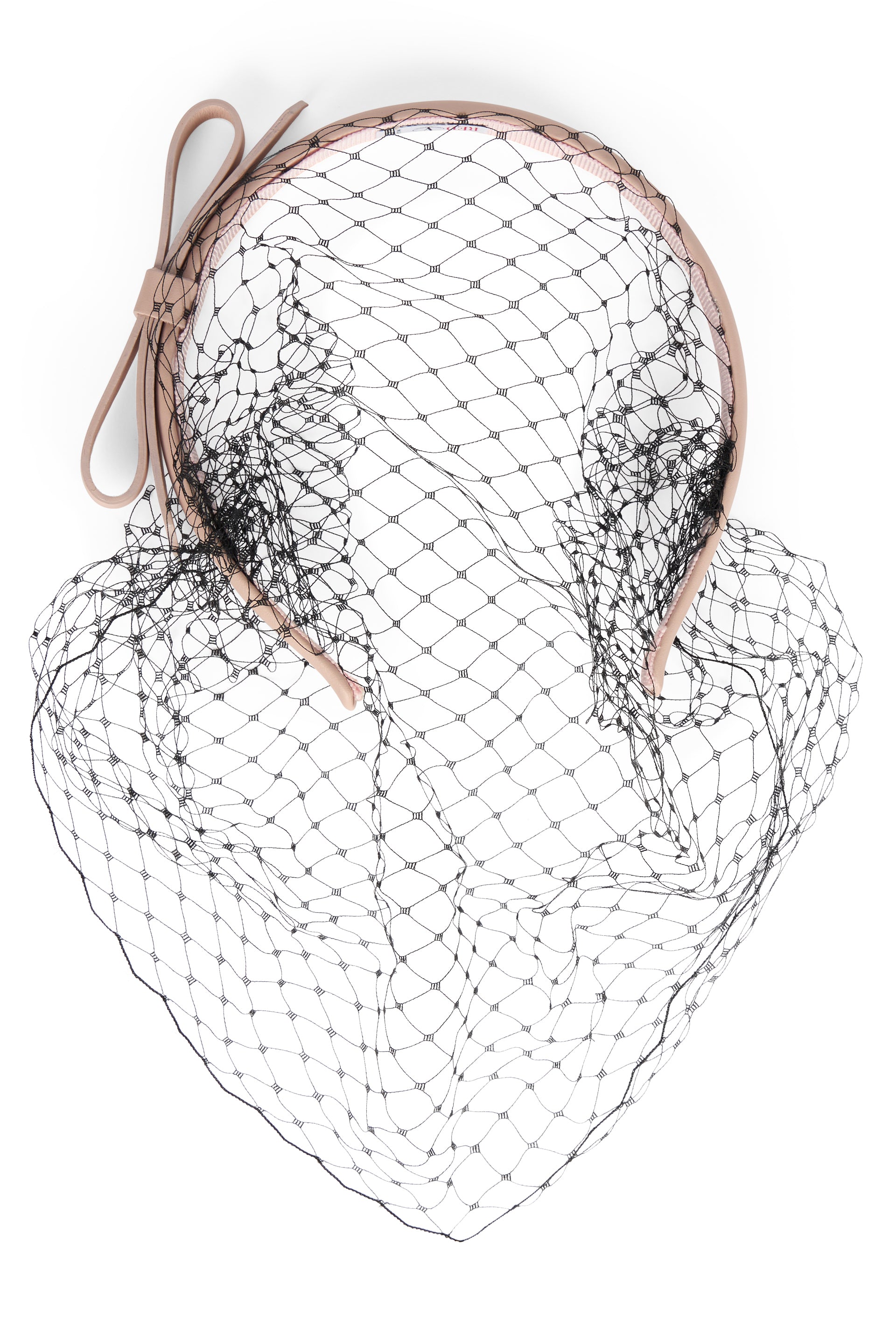 Beige headband with black net.