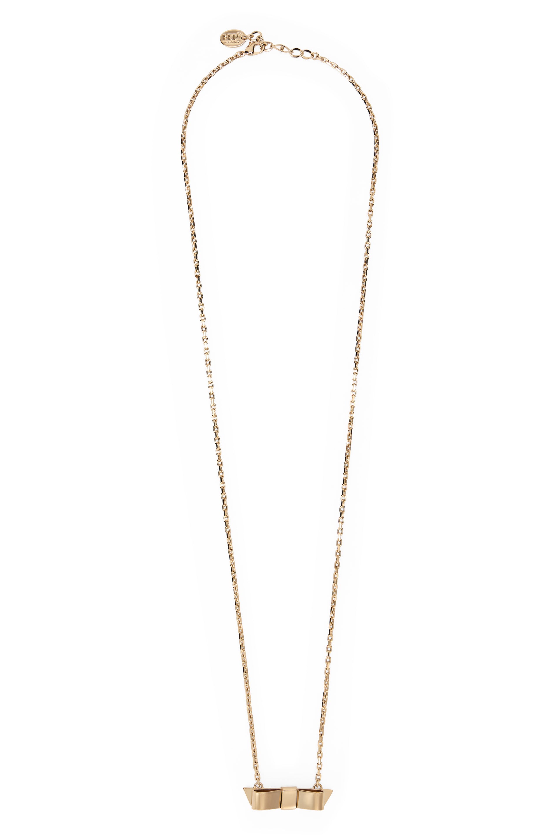 Elegant gold necklace with a delicate and minimalist pendant in the shape of a bow.