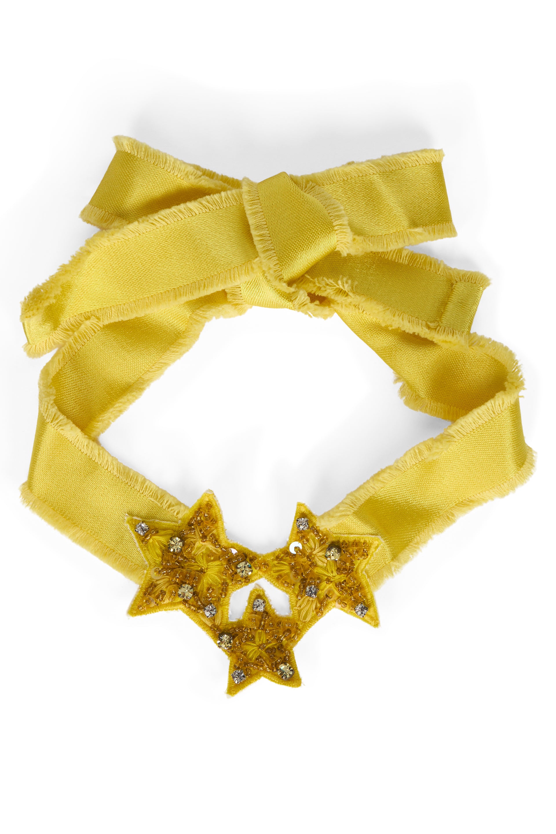 Elegant necklace in mustard color with decorative stars.