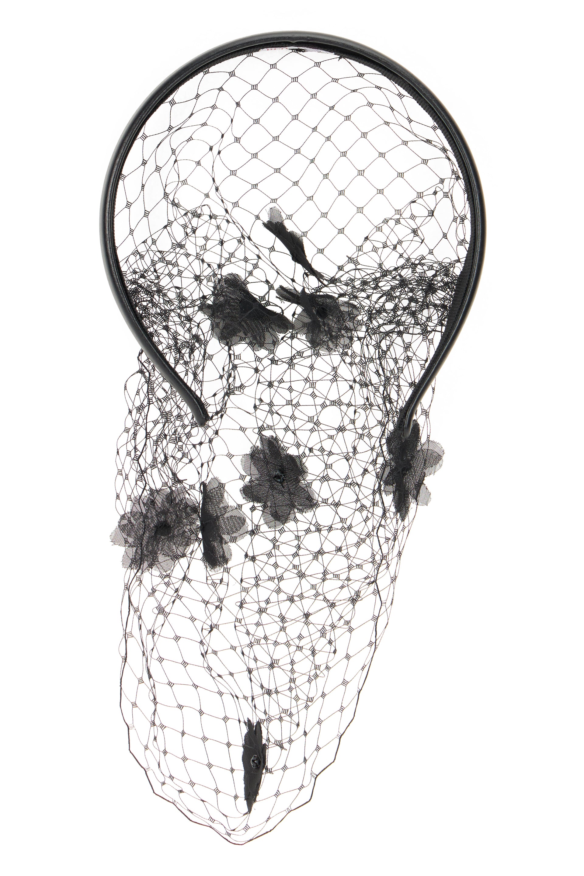 Black headband with net and fabric flower applications.