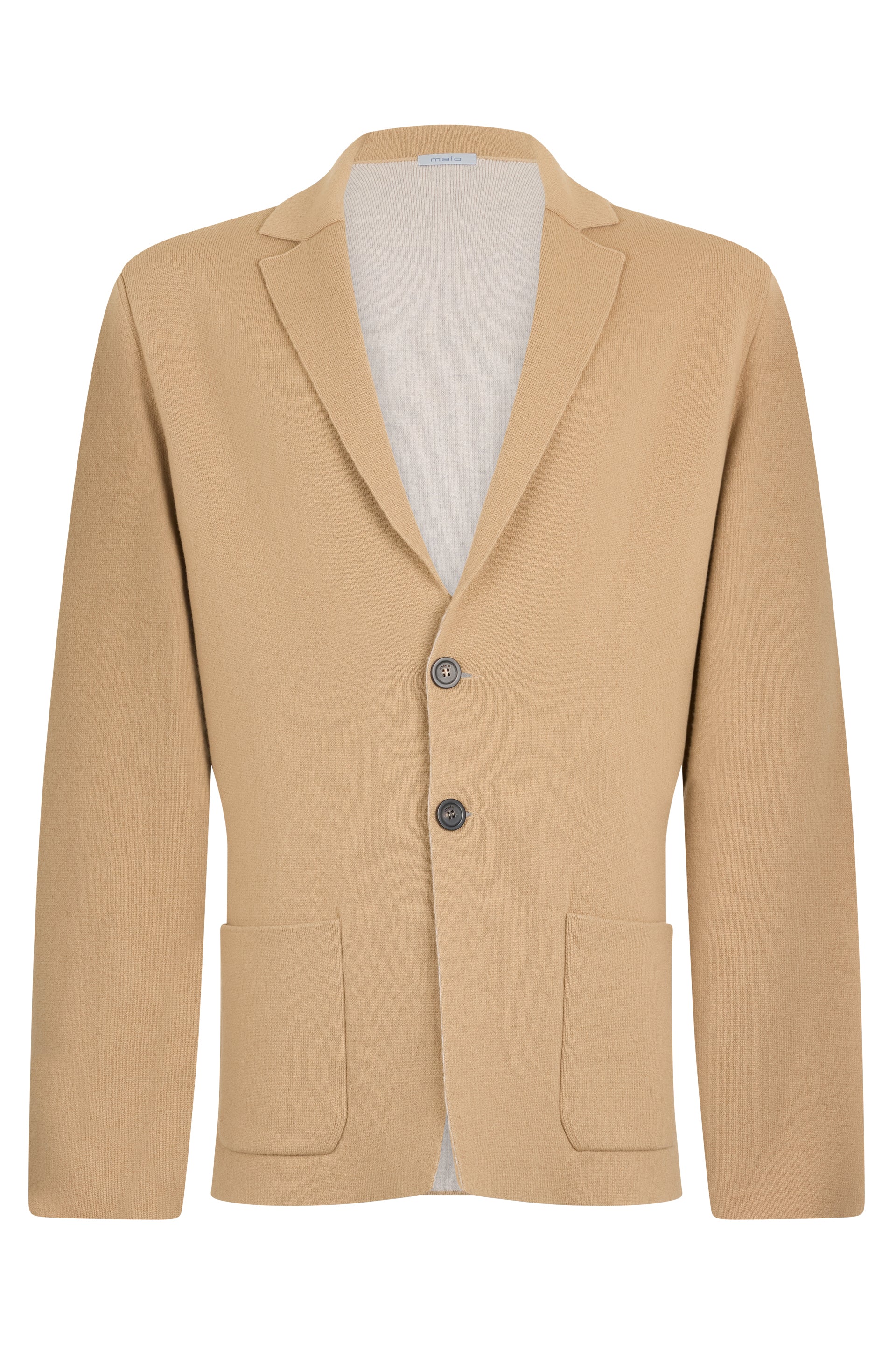 Soft beige jacket with long sleeves.