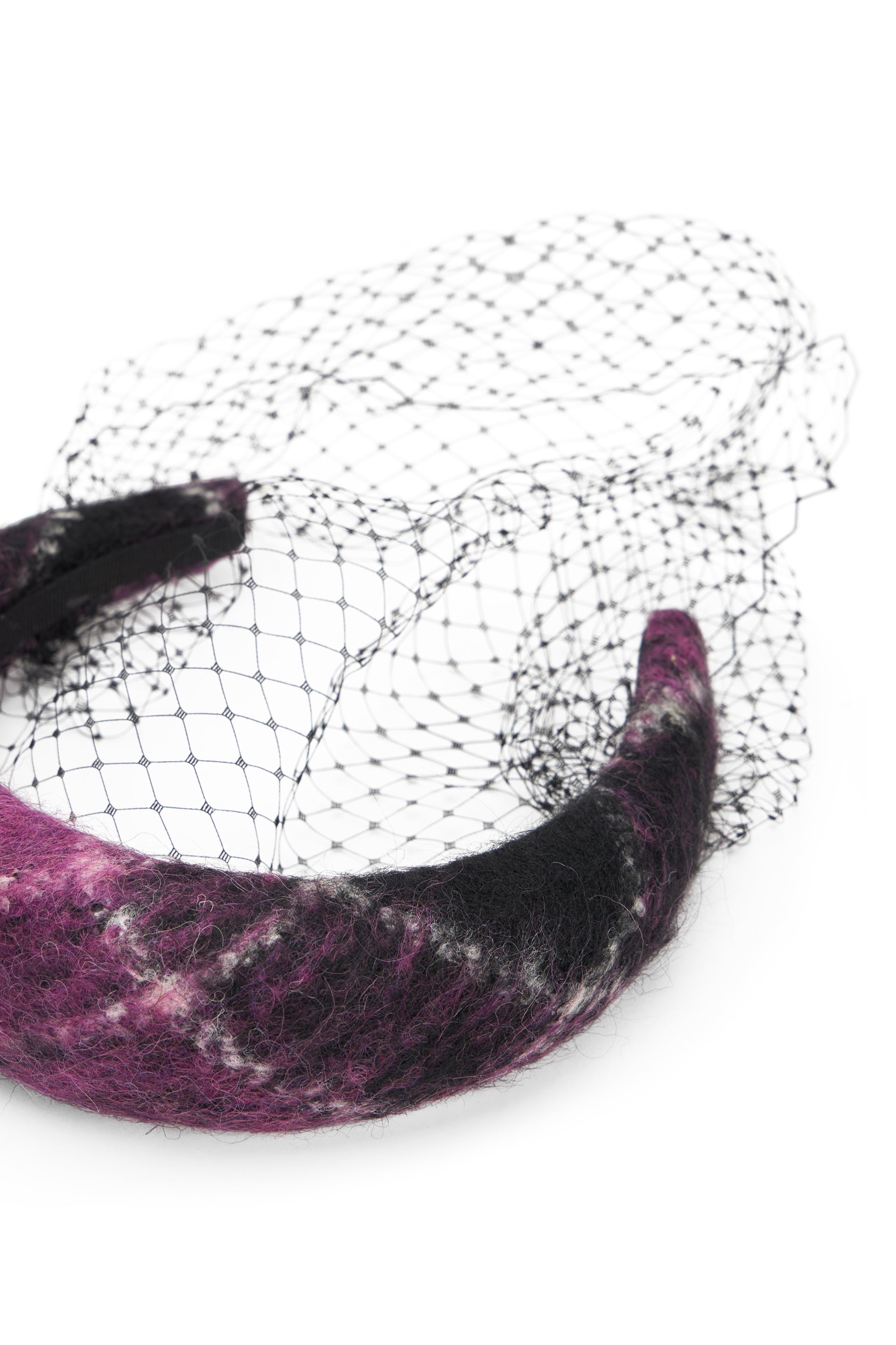 Elegant headband for hair in shades of purple and black with decorative mesh.