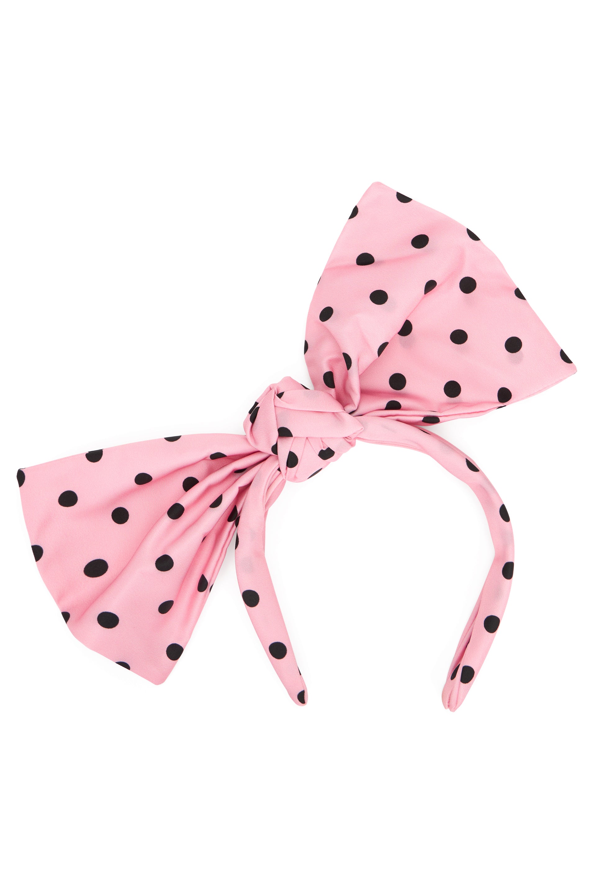 Pink hairband with black polka dot bow.