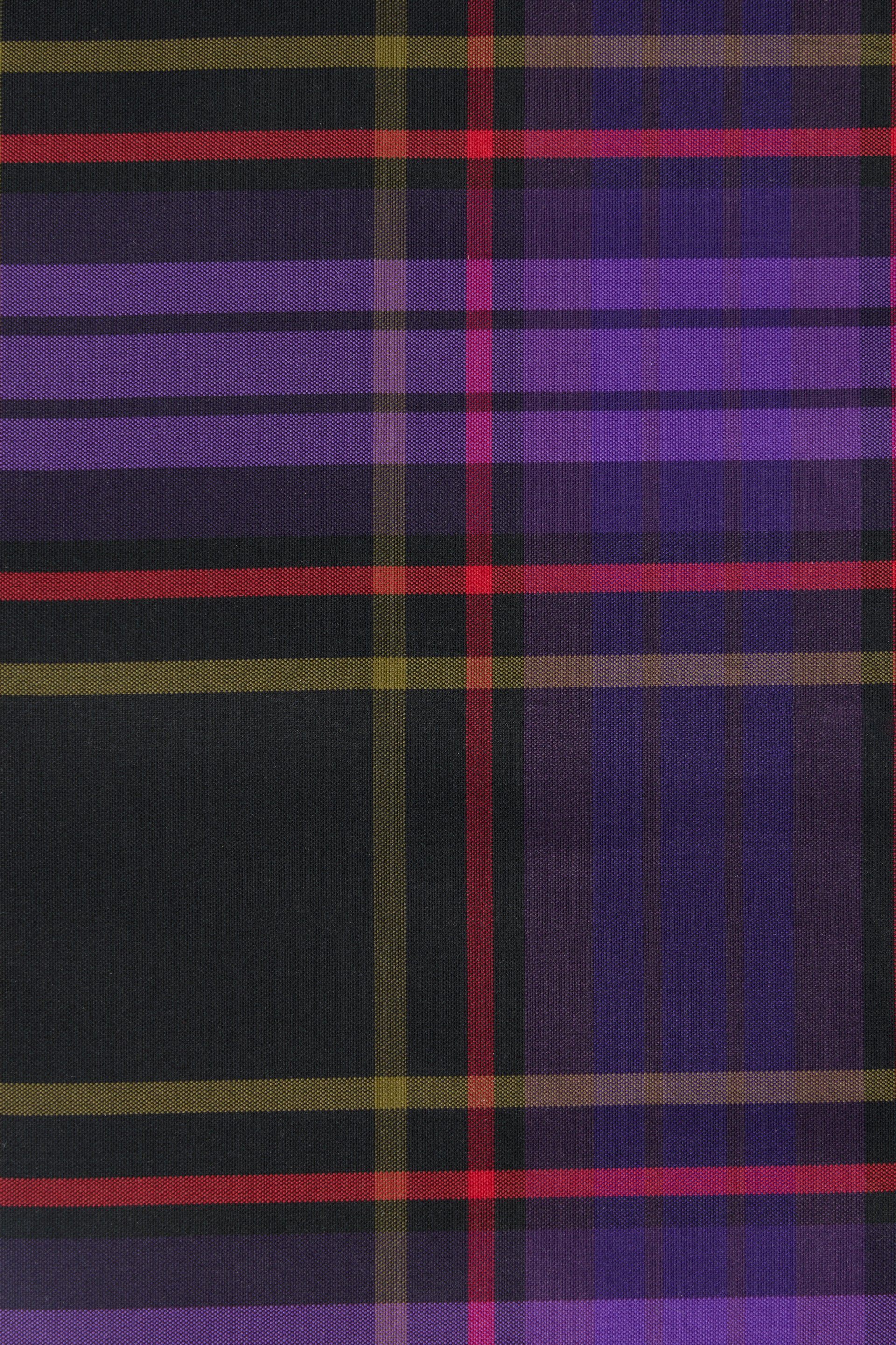 Hairpin in the shape of a bow with tartan pattern in shades of black and purple, elegant and versatile.