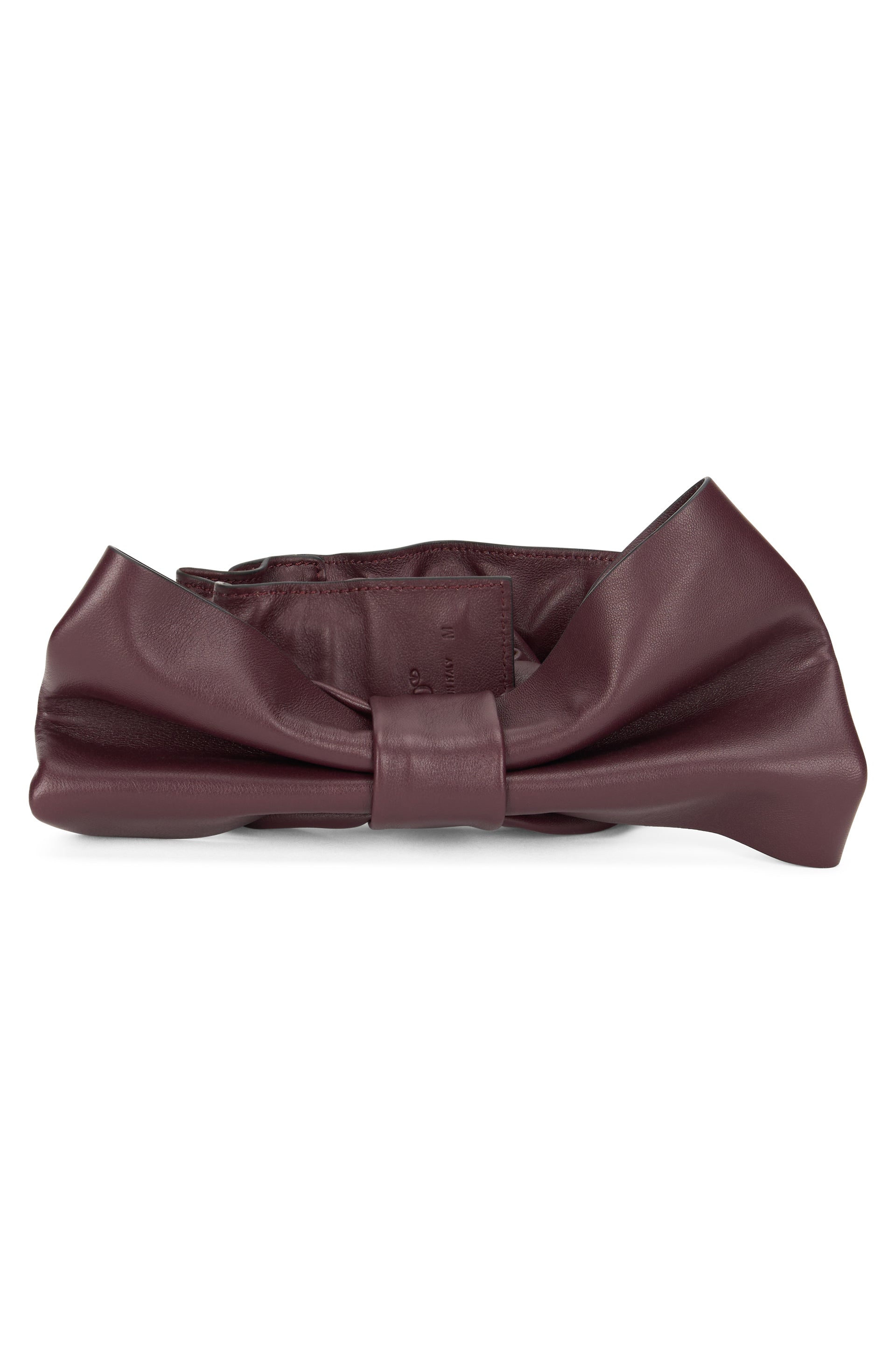 Hair accessory in burgundy leather with an elegant bow.