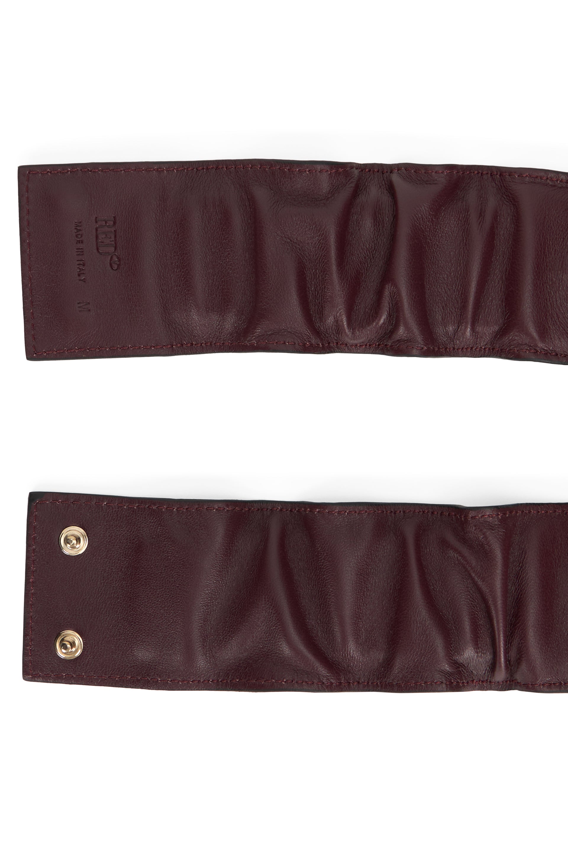 Hair accessory in burgundy leather with an elegant bow.