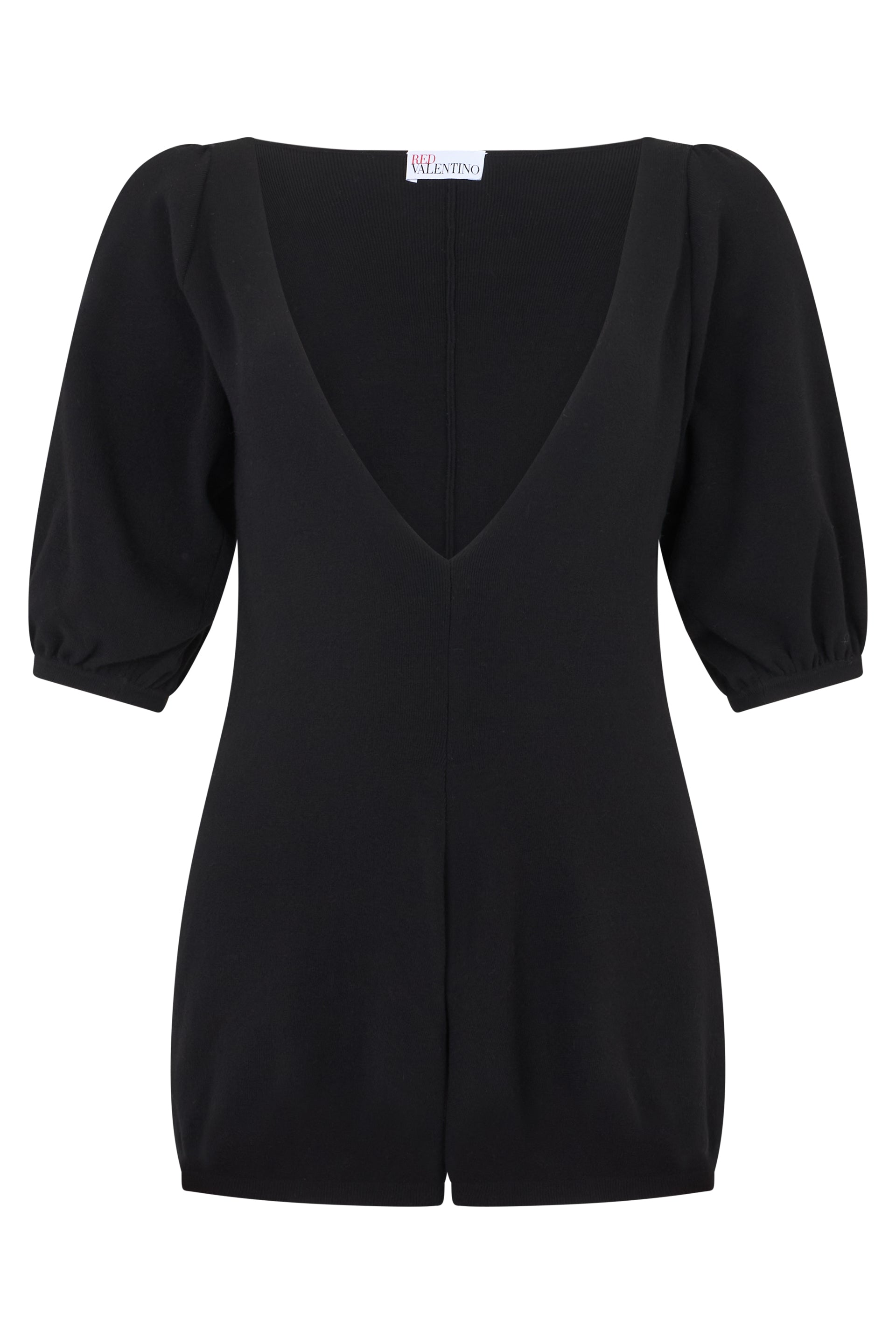Black short jumpsuit with a V-neck and balloon sleeves.
