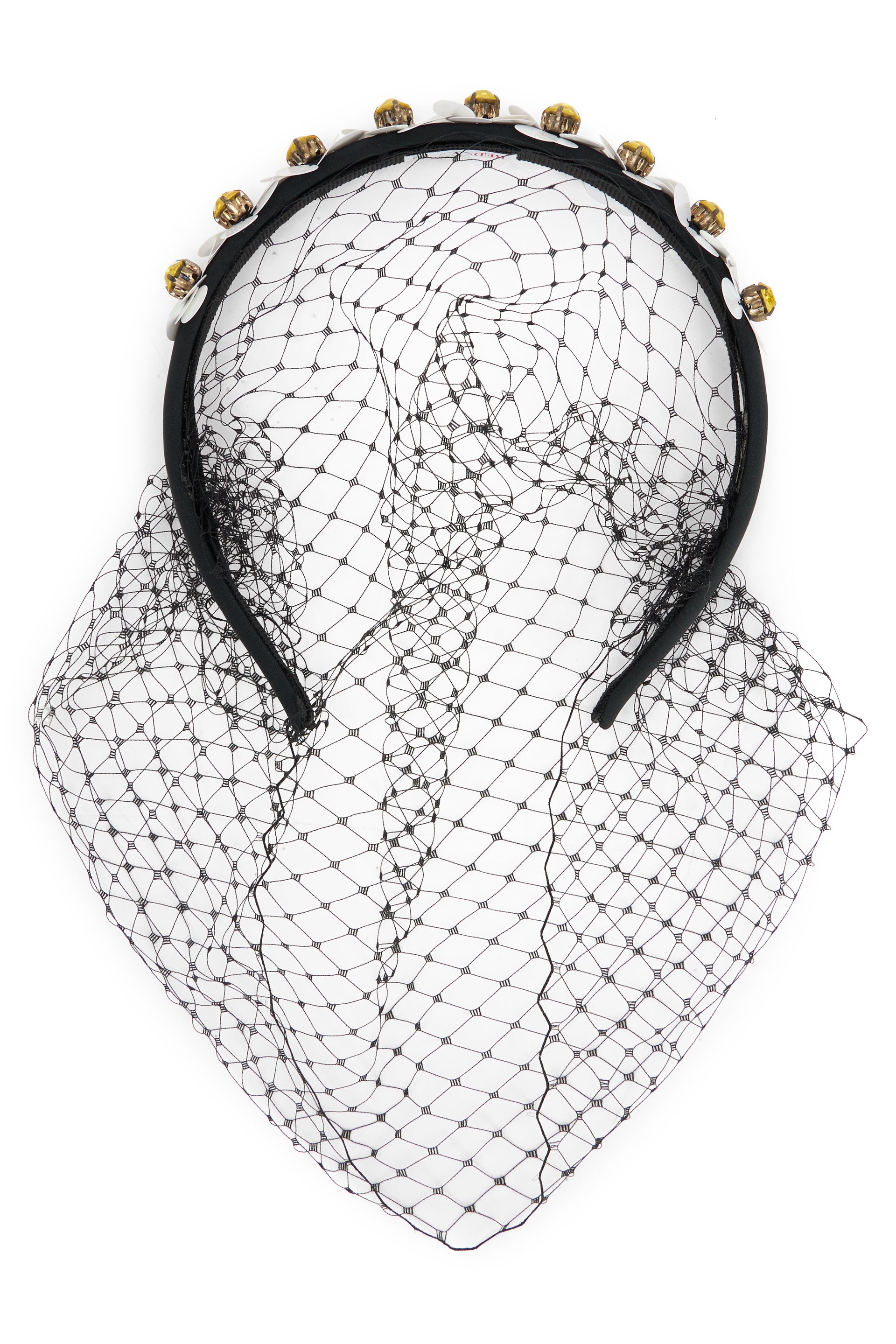 Elegant headband with mesh, flowers and luminous rhinestones.