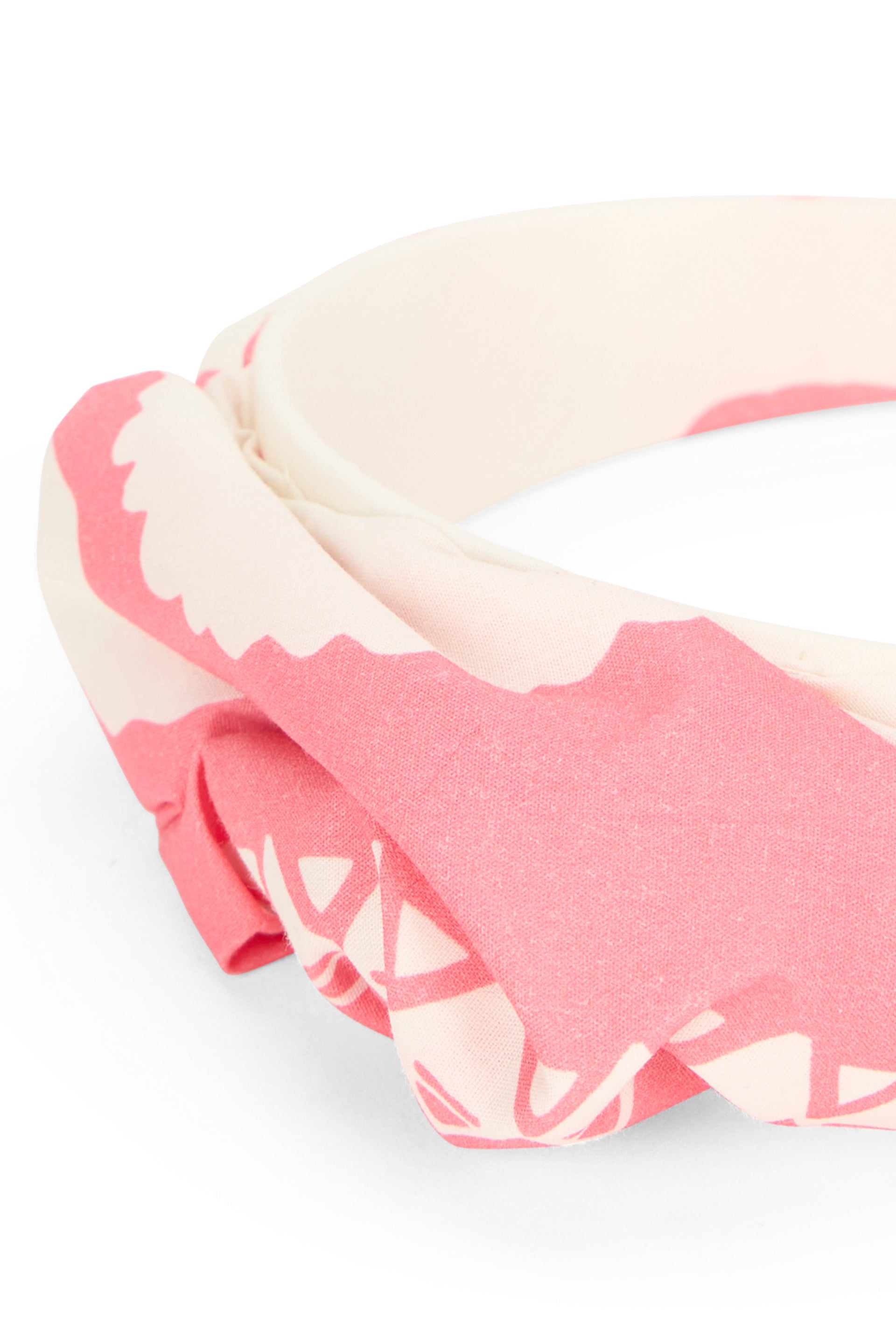 Elegant white cream and pink headband for any occasion.
