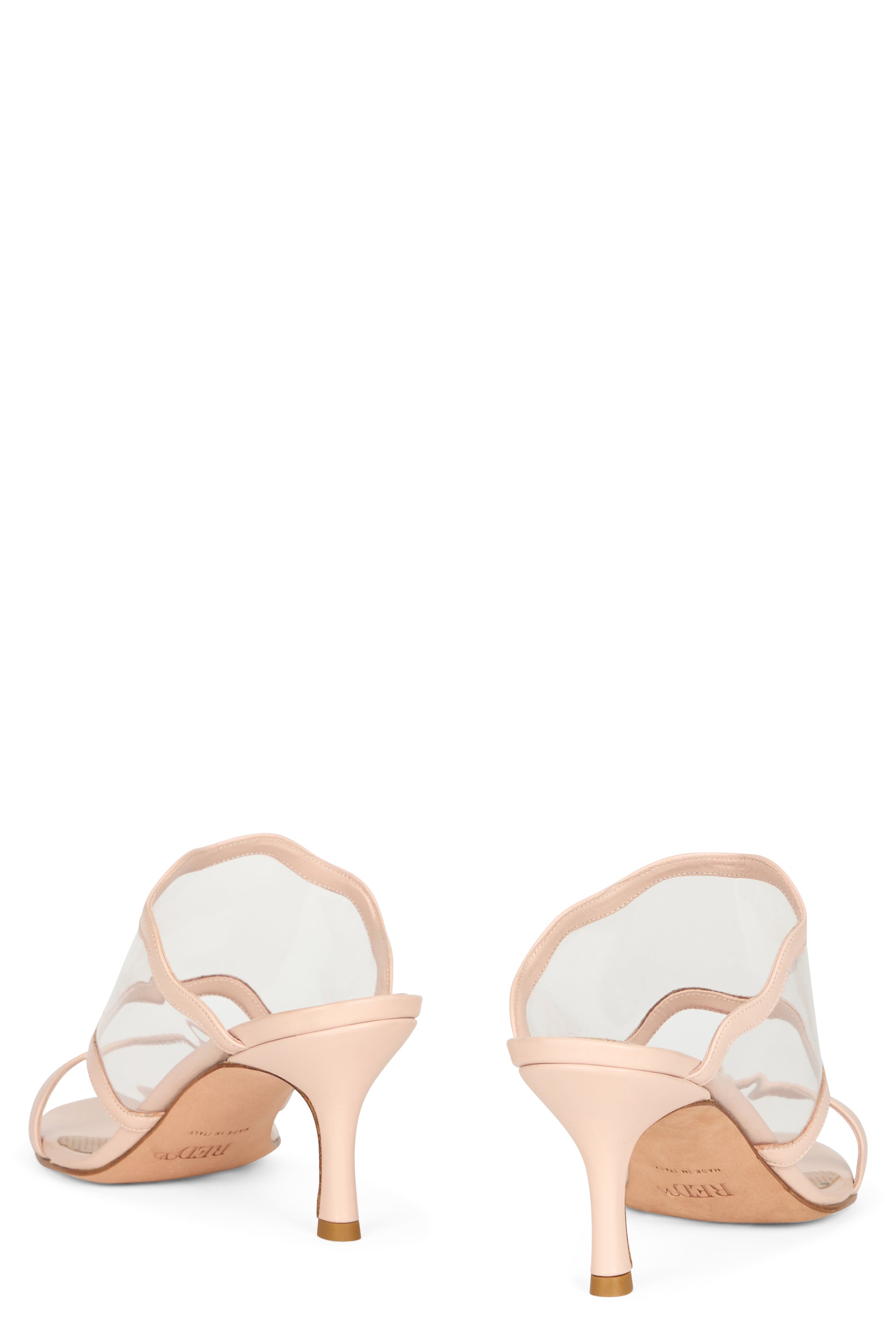 Beige elegant sandals with a medium heel.