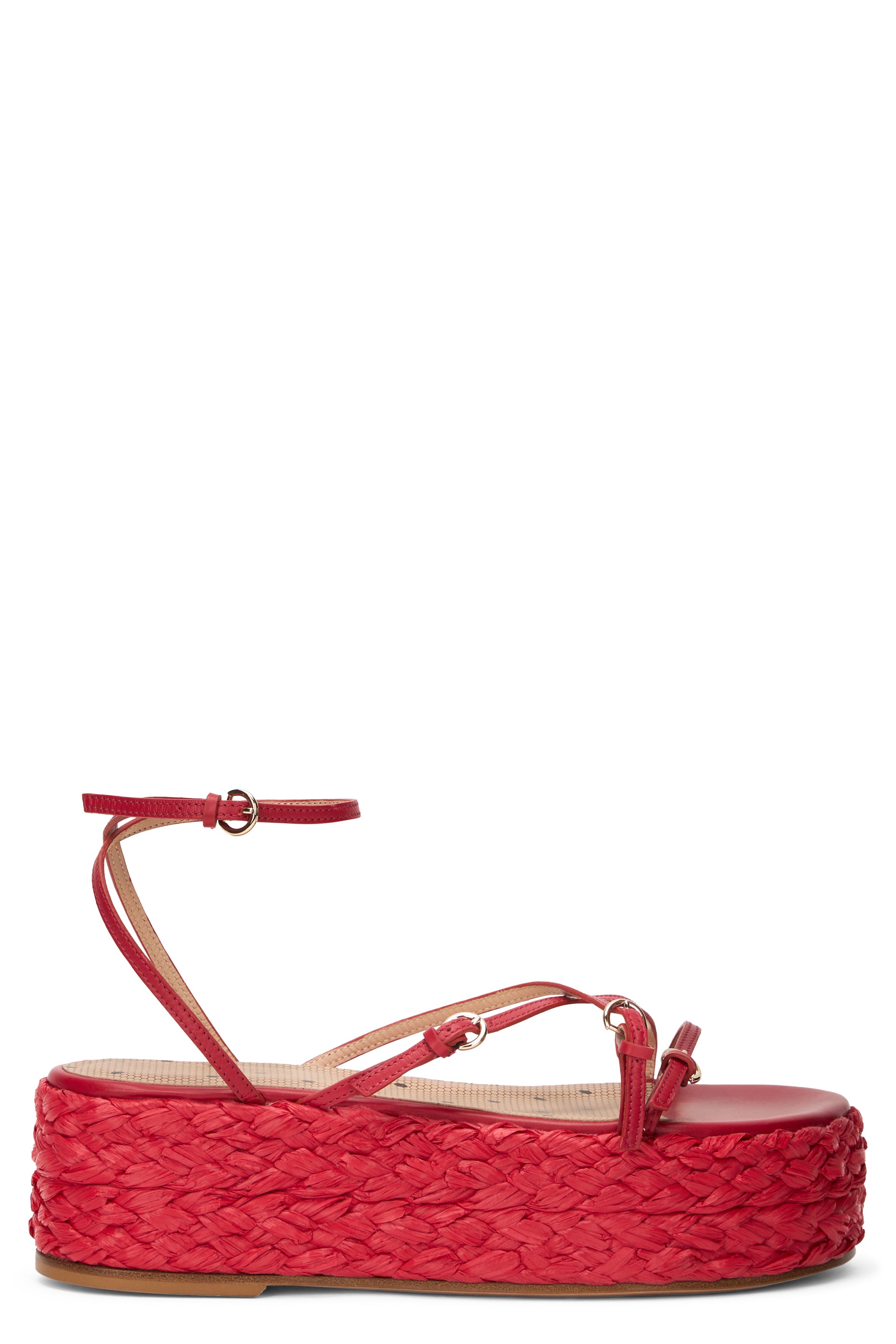 Red platform sandals with thin straps.