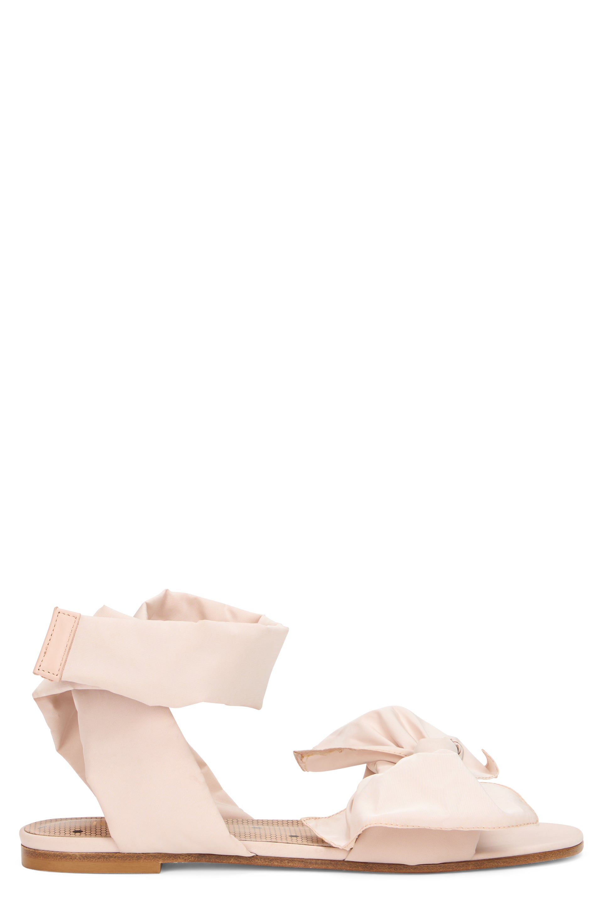 Pale pink summer sandals with bow and adjustable strap.