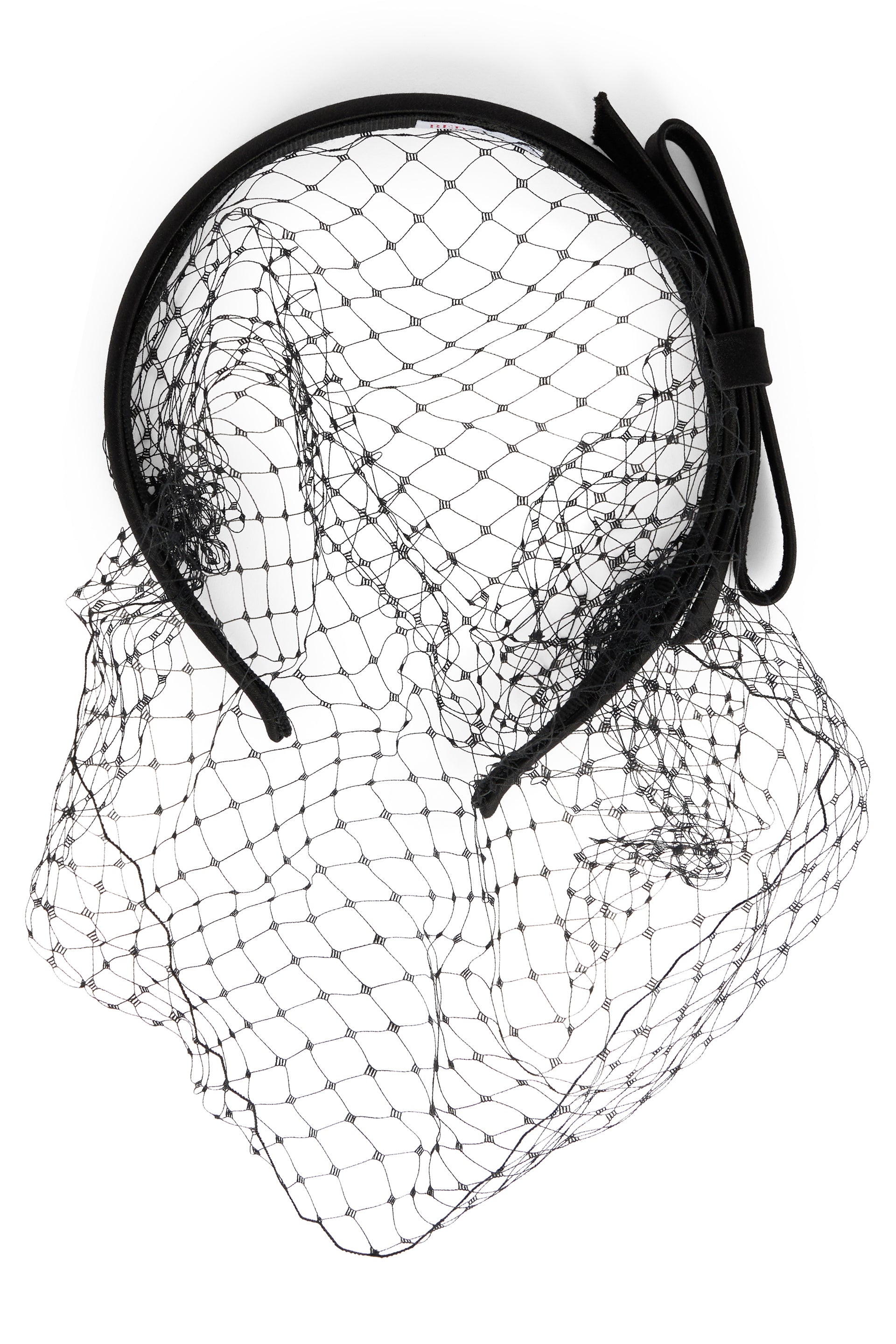 Elegant headgear in lightweight mesh versatile.