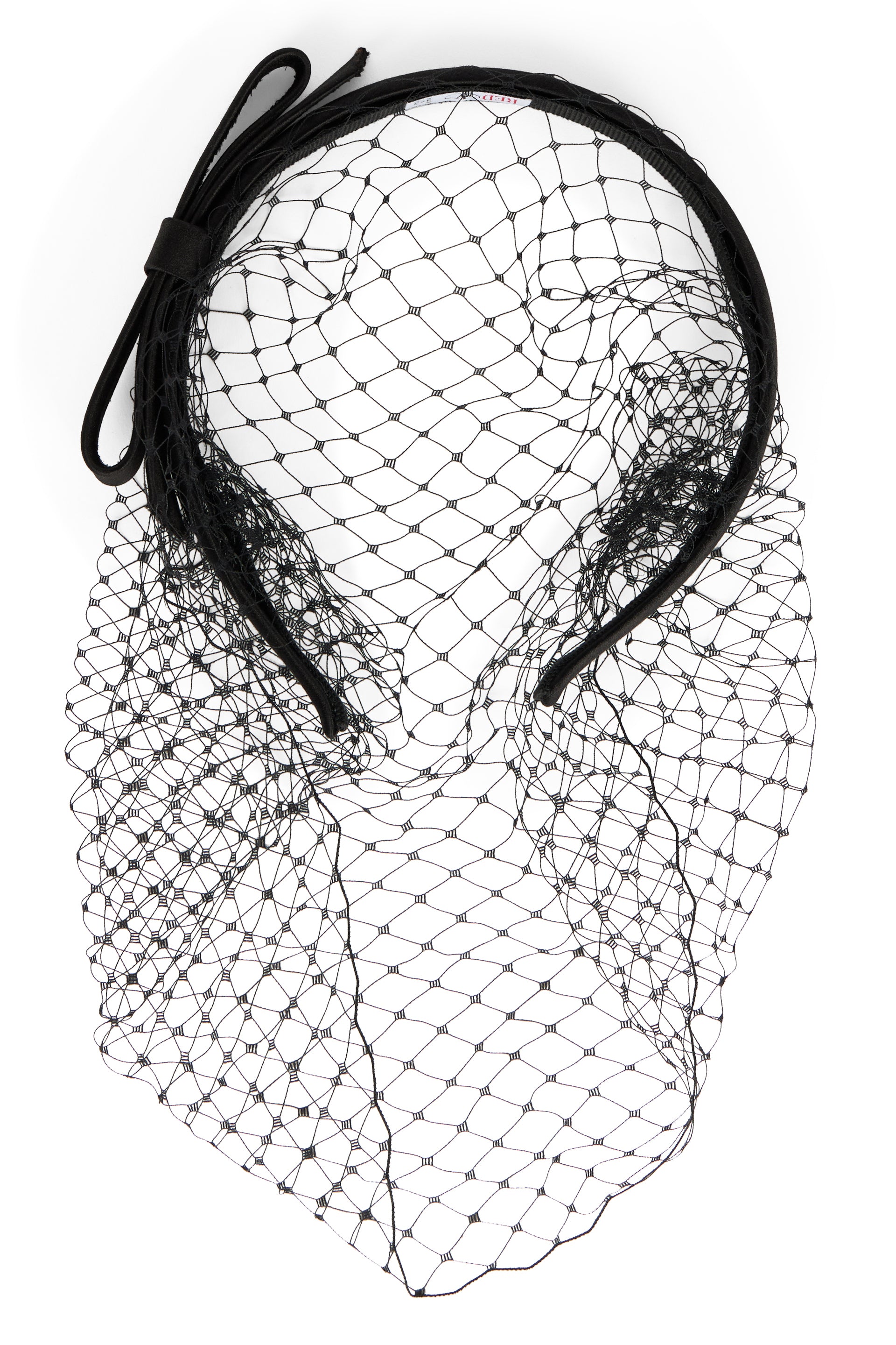 Elegant headgear in lightweight mesh versatile.