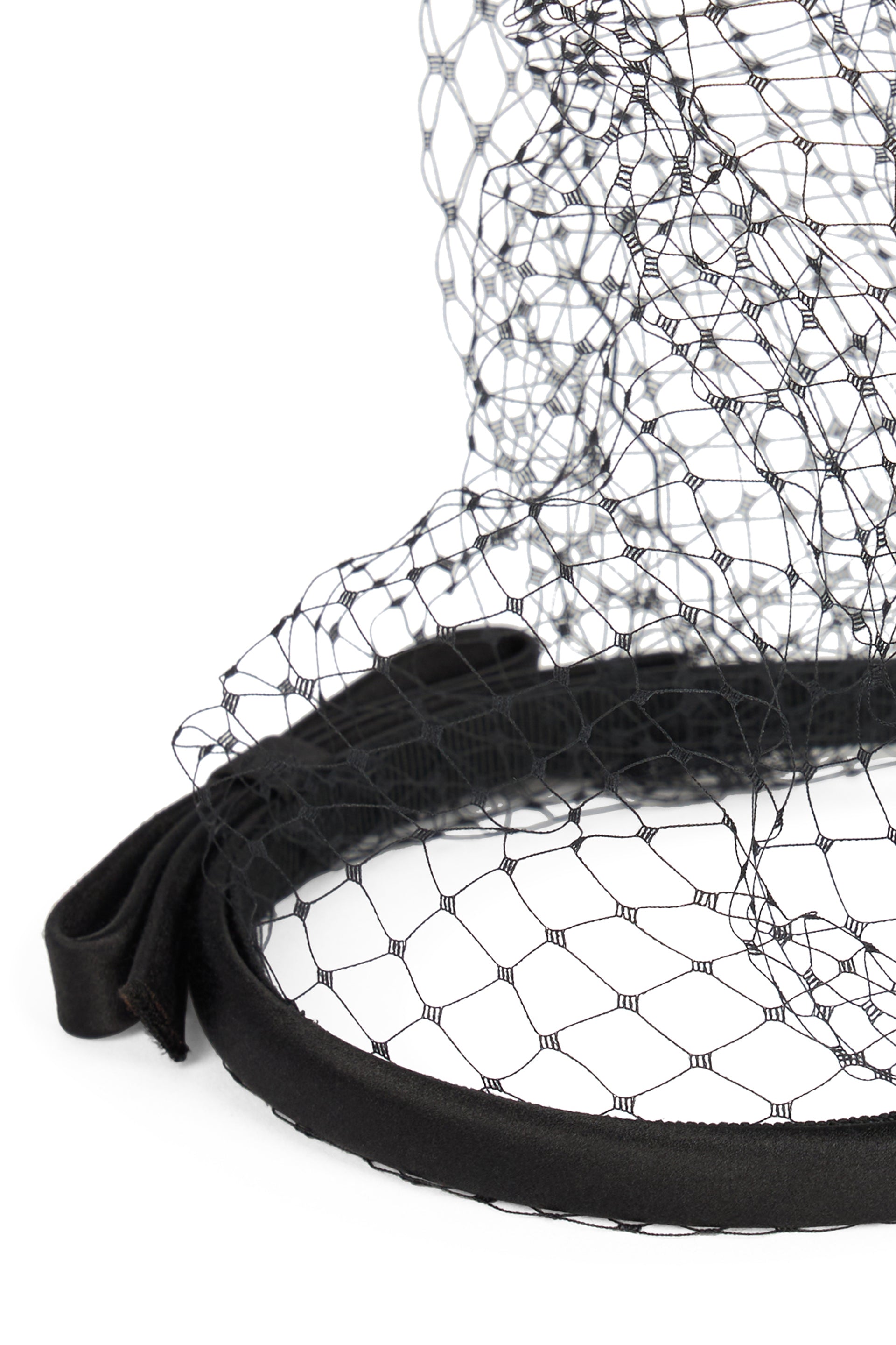 Elegant headgear in lightweight mesh versatile.