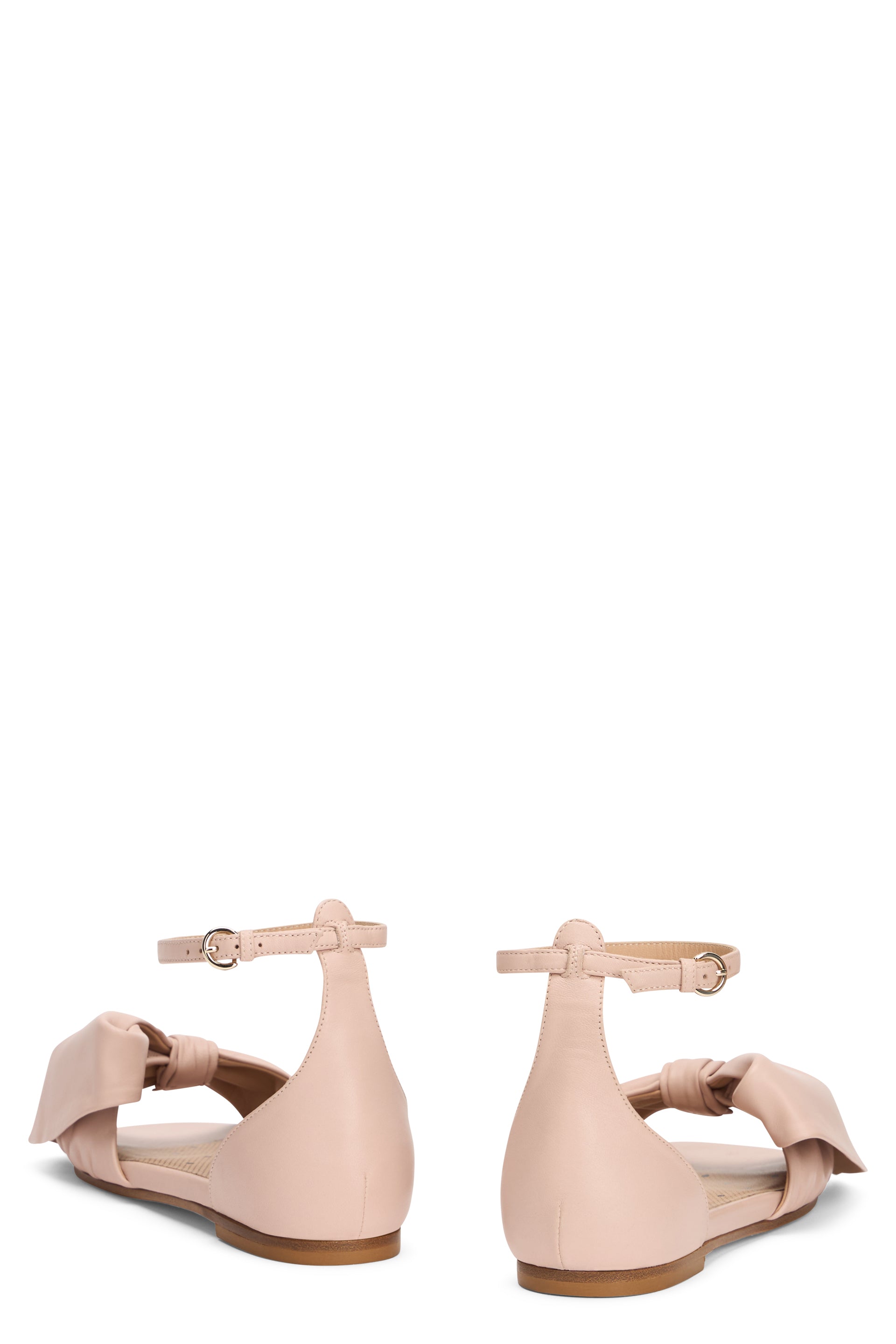 Pink low sandals with a stylish and versatile strap.