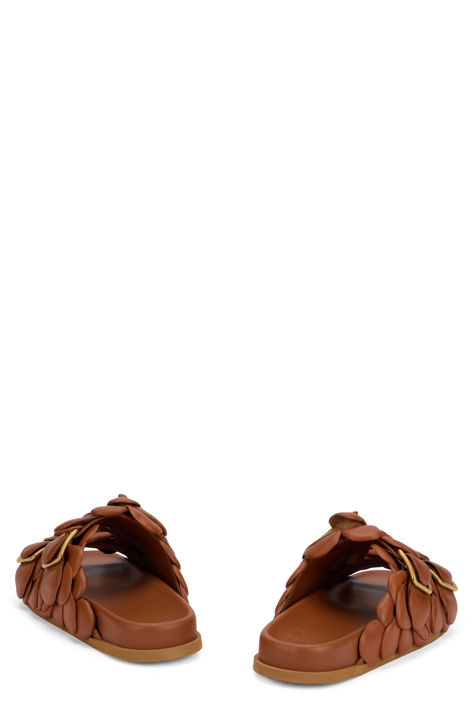 Comfortable slippers made of soft brown material